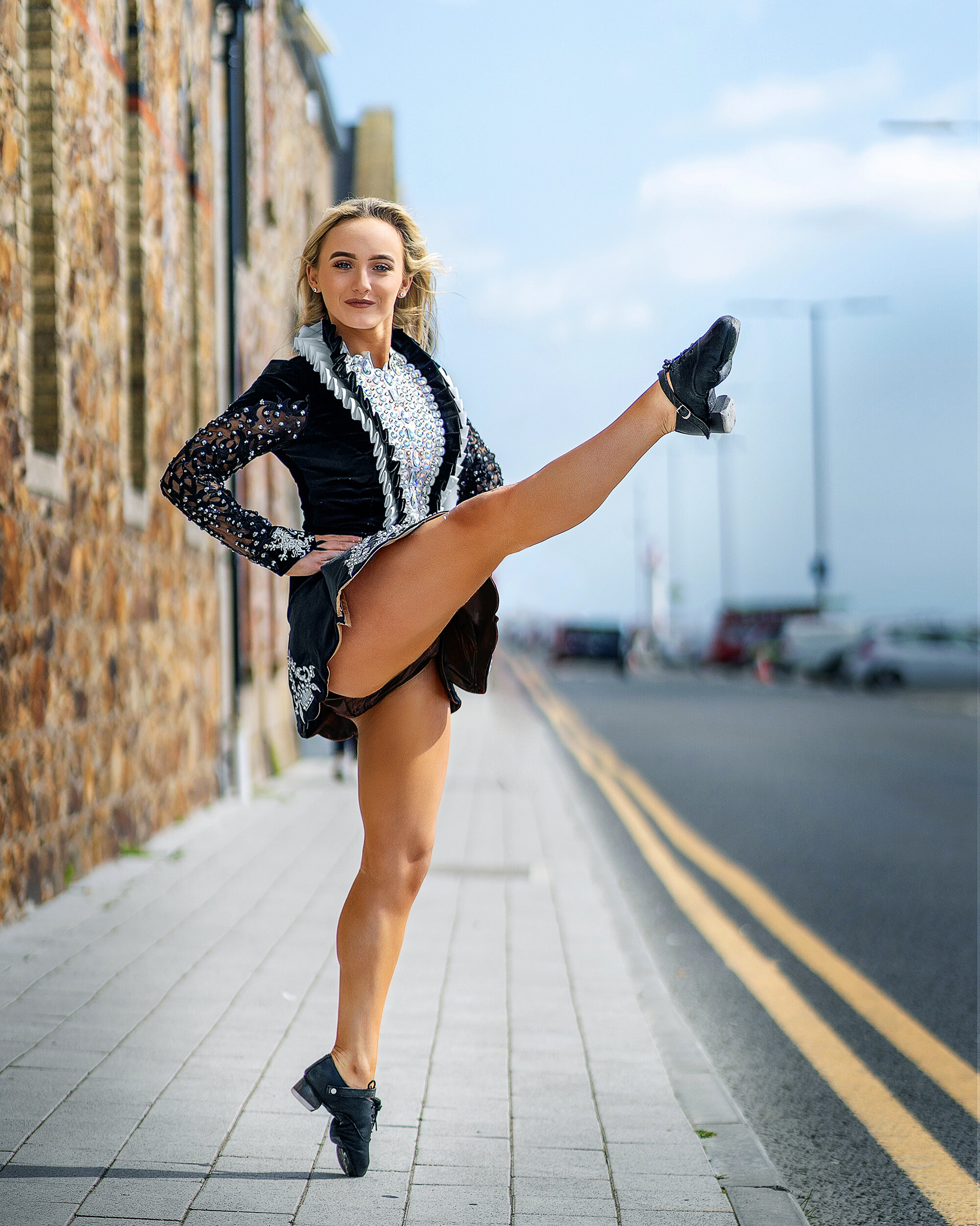 Irish dancer dancing on the street in Howth