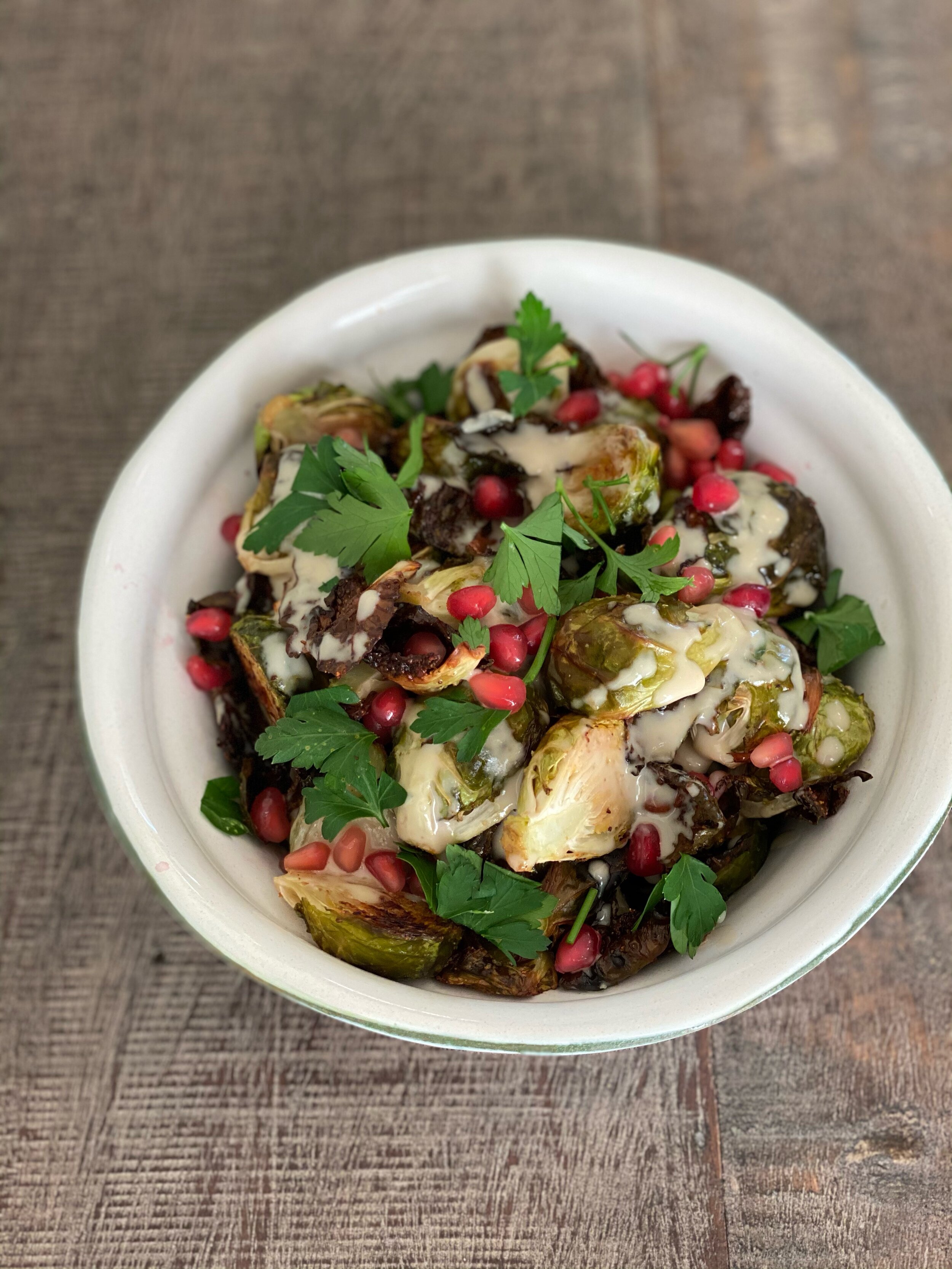 tahini brussels sprouts with pomegranate and herbs