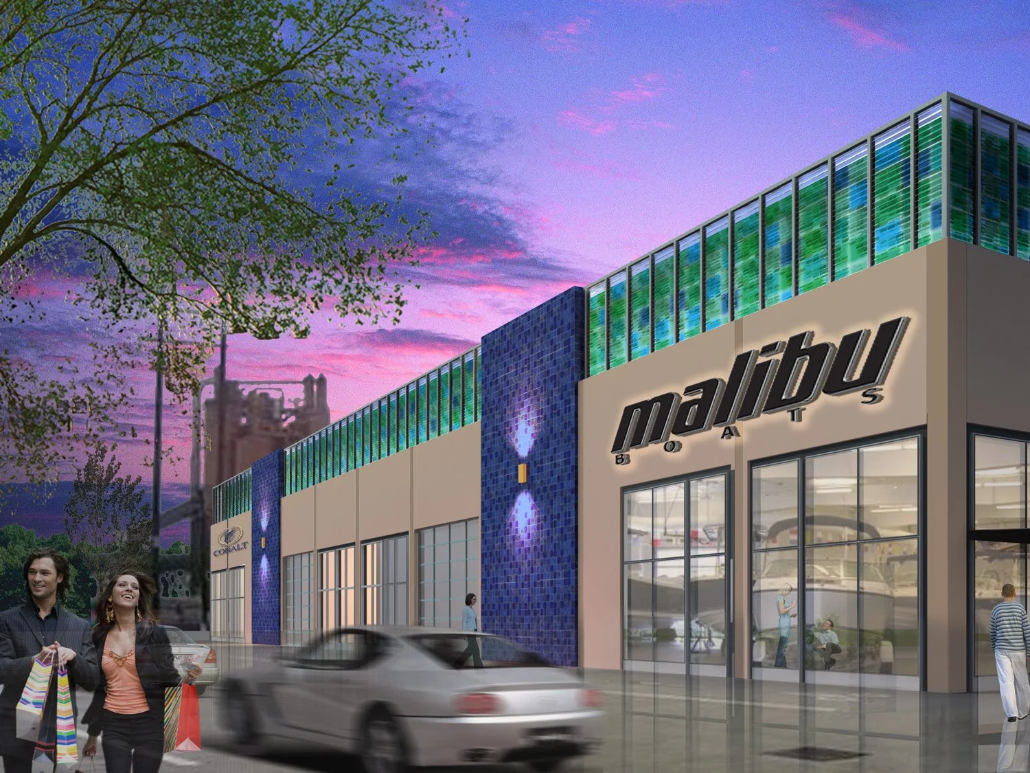 Exterior view of Malibu Boats store at sunset with people shopping and cars parked outside.