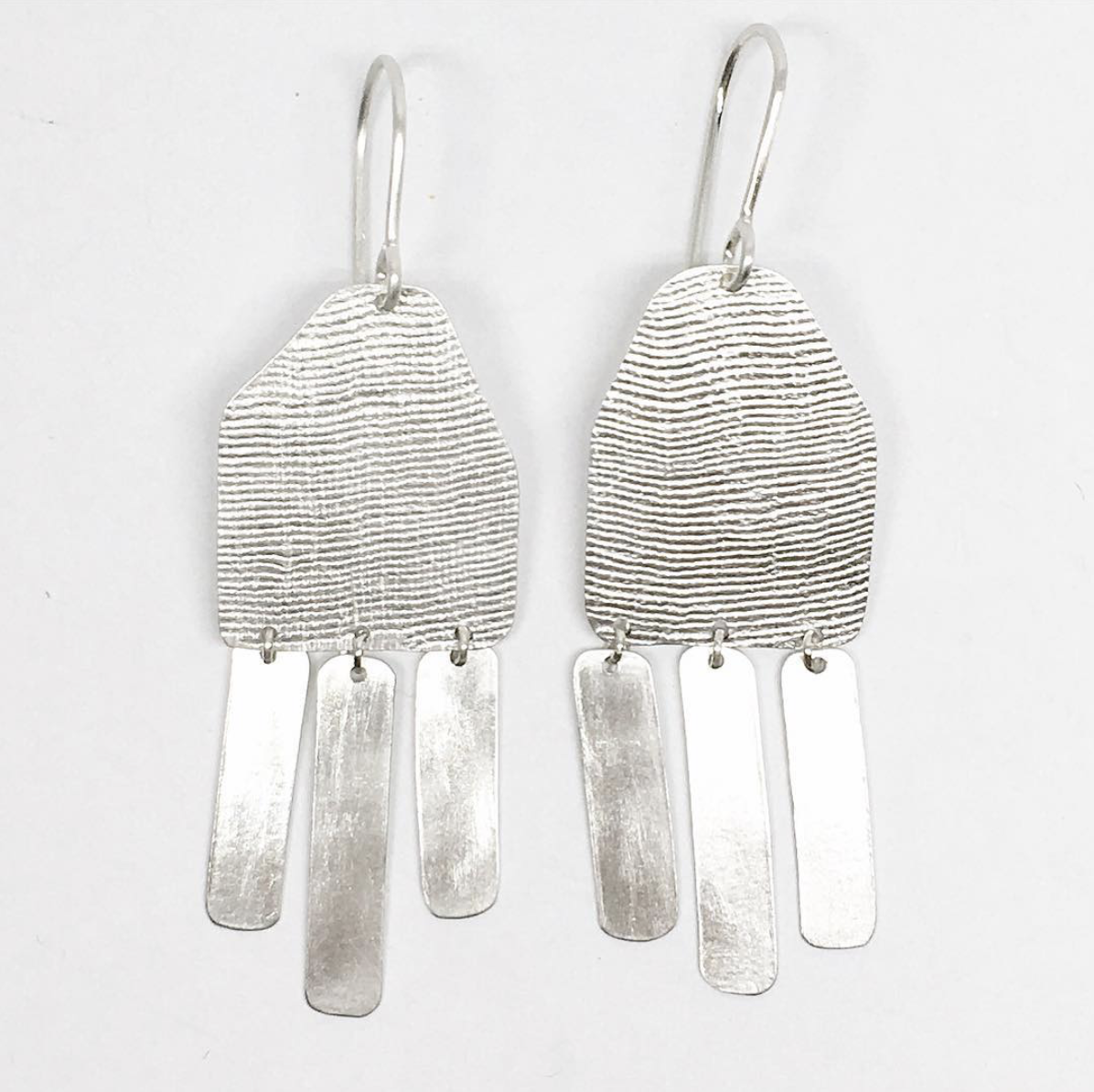 Silver atssel earrings.jpeg