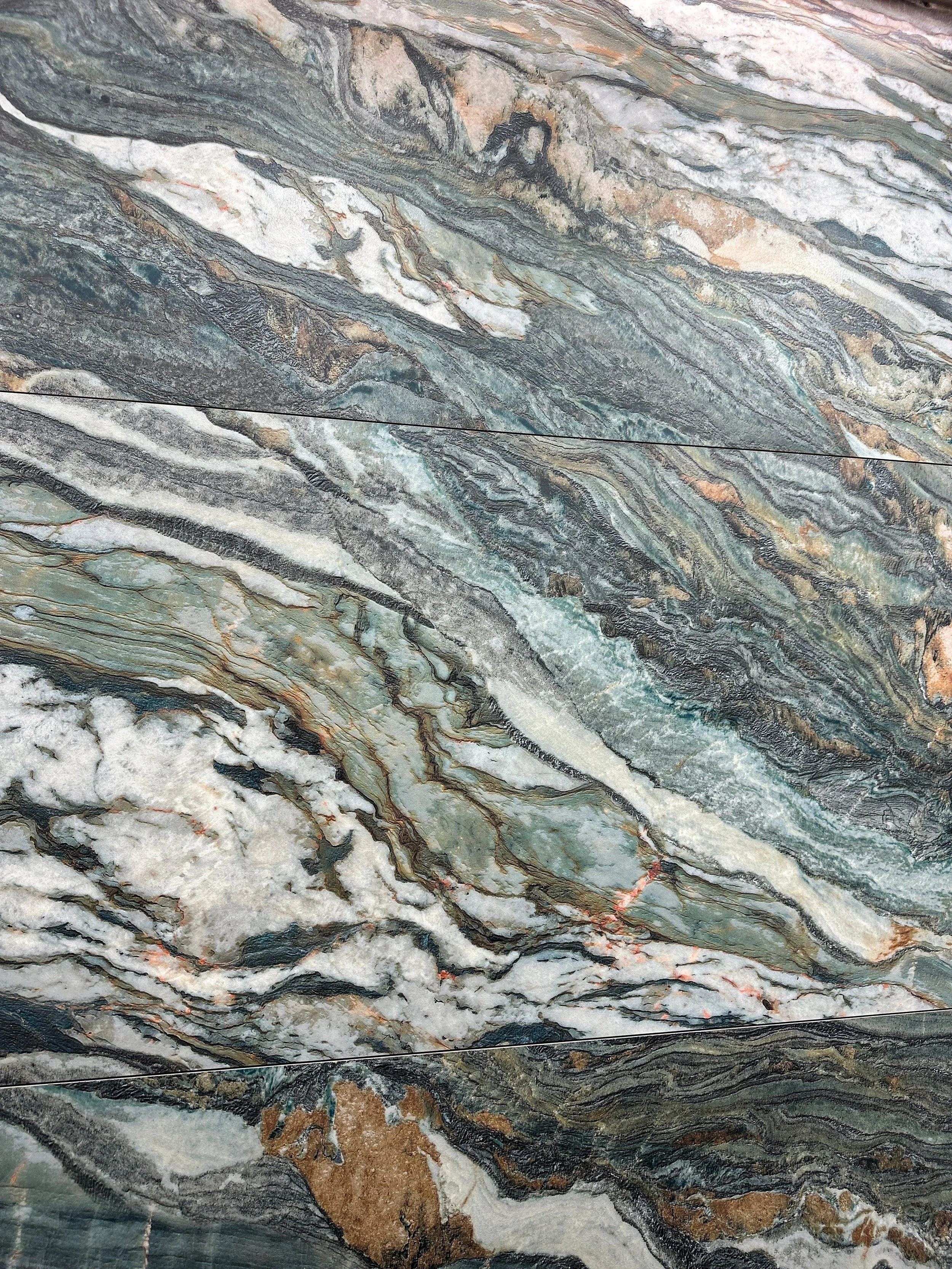 Wanderer by plonc. — authored porcelain surface featuring pronounced geological relief with layered mineral greens, graphite, white and restrained rust tones inspired by weathered Australian landscapes.