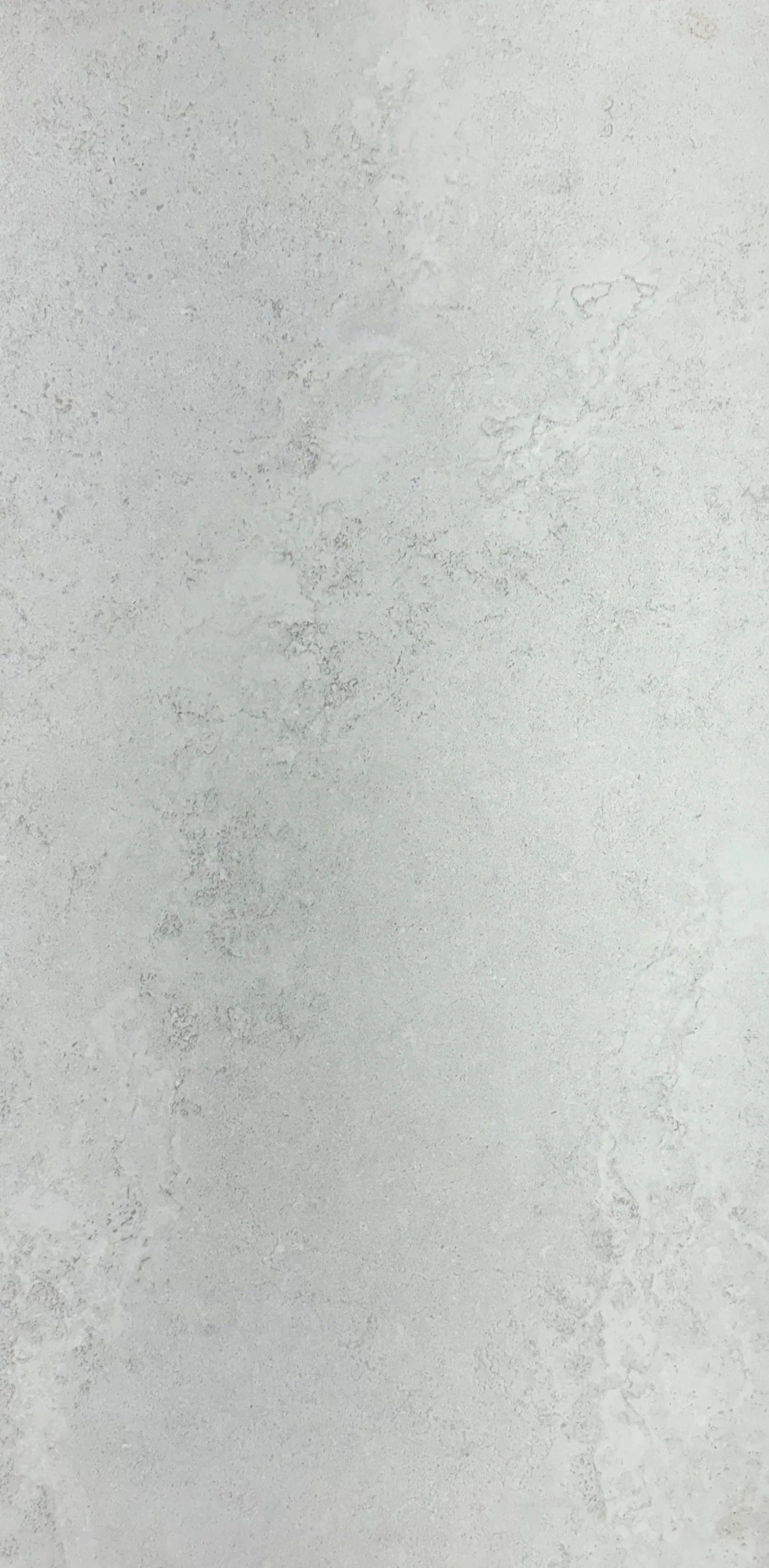 3rd Rock by plonc. — authored porcelain surface featuring sculpted mineral relief, layered geological movement and soft grey tonal variation inspired by Earth’s formation and planetary geology.