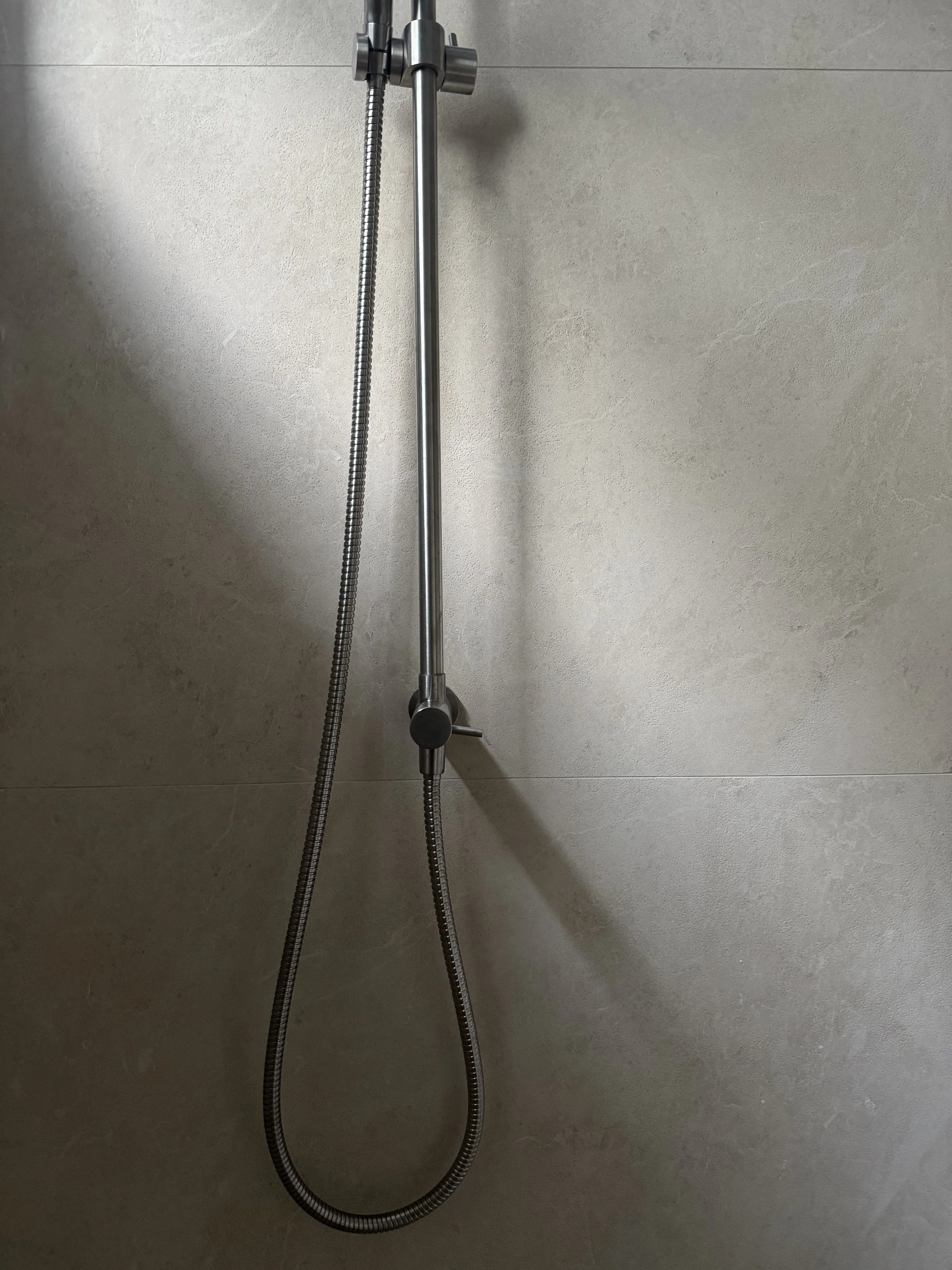 Sorrento Moon by plonc., an authored large-format porcelain surface with soft mineral tones, subtle lunar relief and a textured porcelain finish.