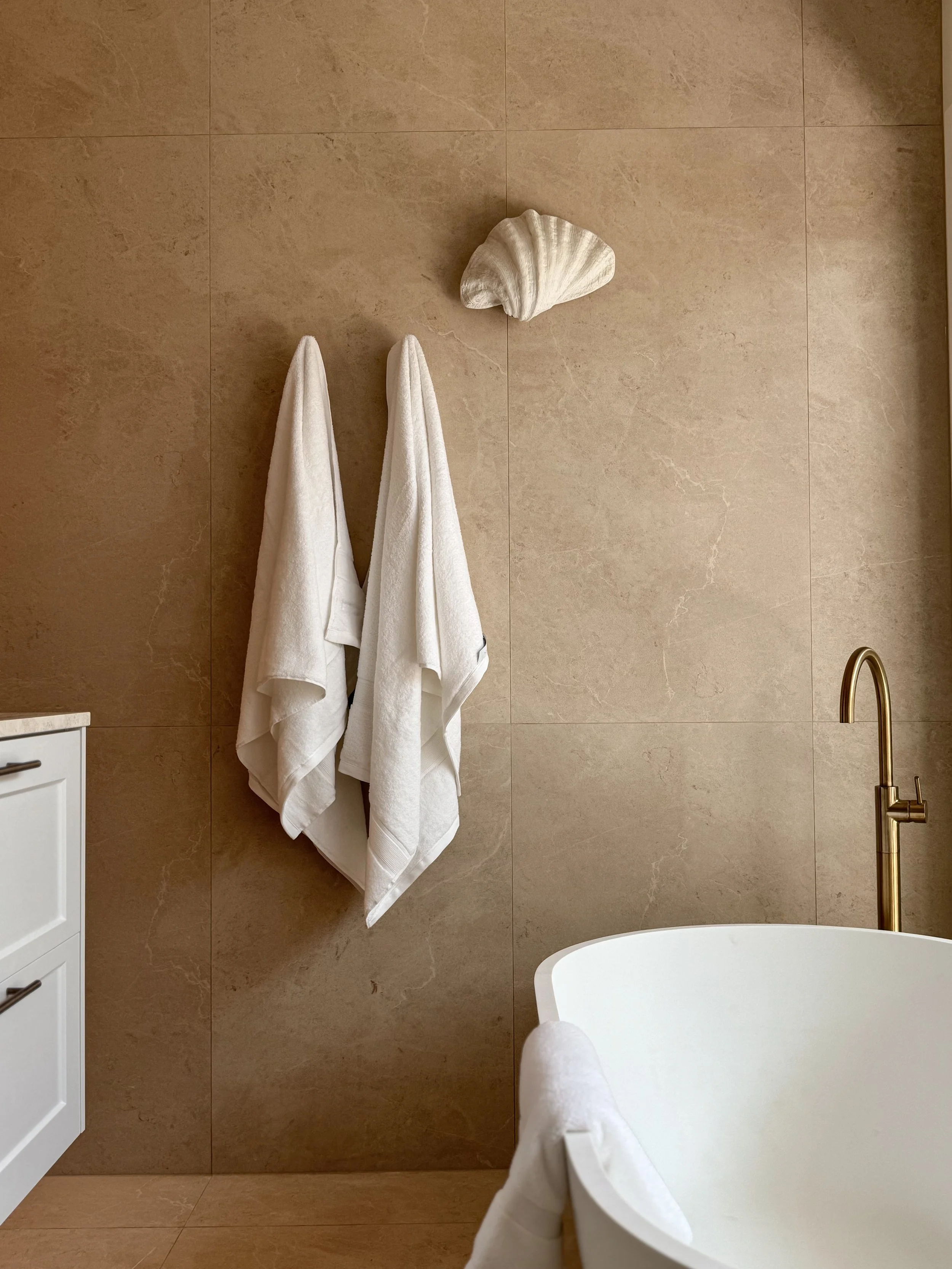 Sorrento Moon authored porcelain surface by plonc. featuring soft mineral beige tones and subtle crater-like relief inspired by repeated observations of the moon.