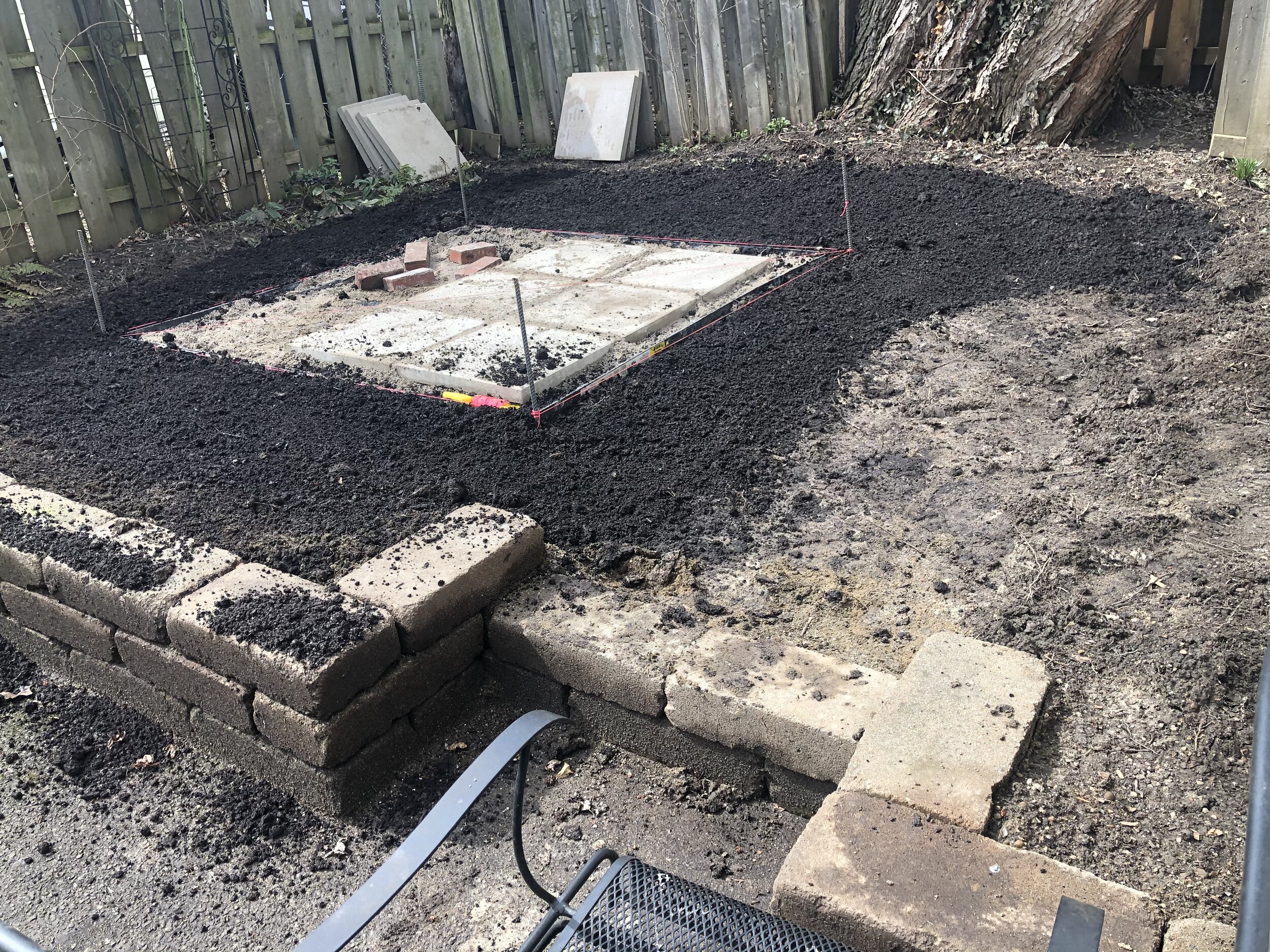  We ensured all of the paver joints were uniform and tight before we finished things off with repurposed bricks saved from another area of the landscape. 