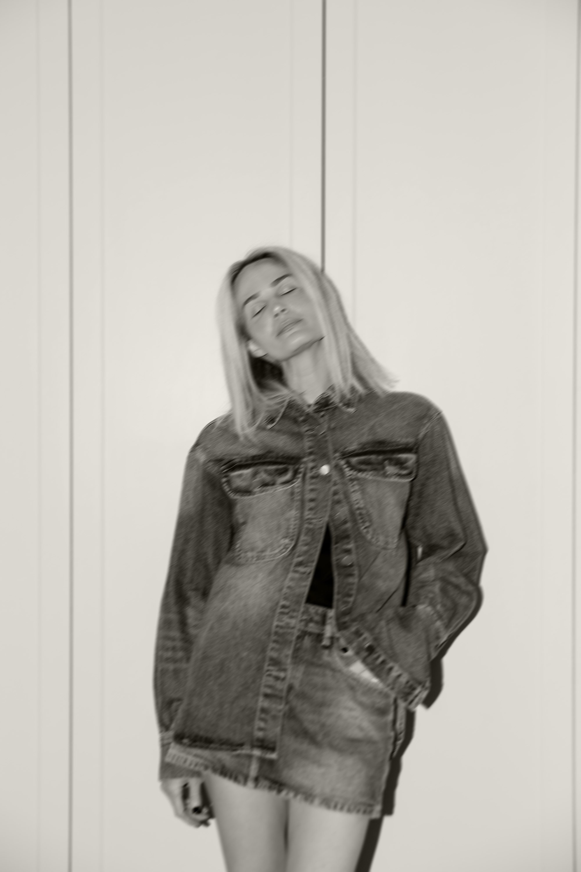 Brooke Testoni wearing DL 1961 Denim and Toteme Riding Boots