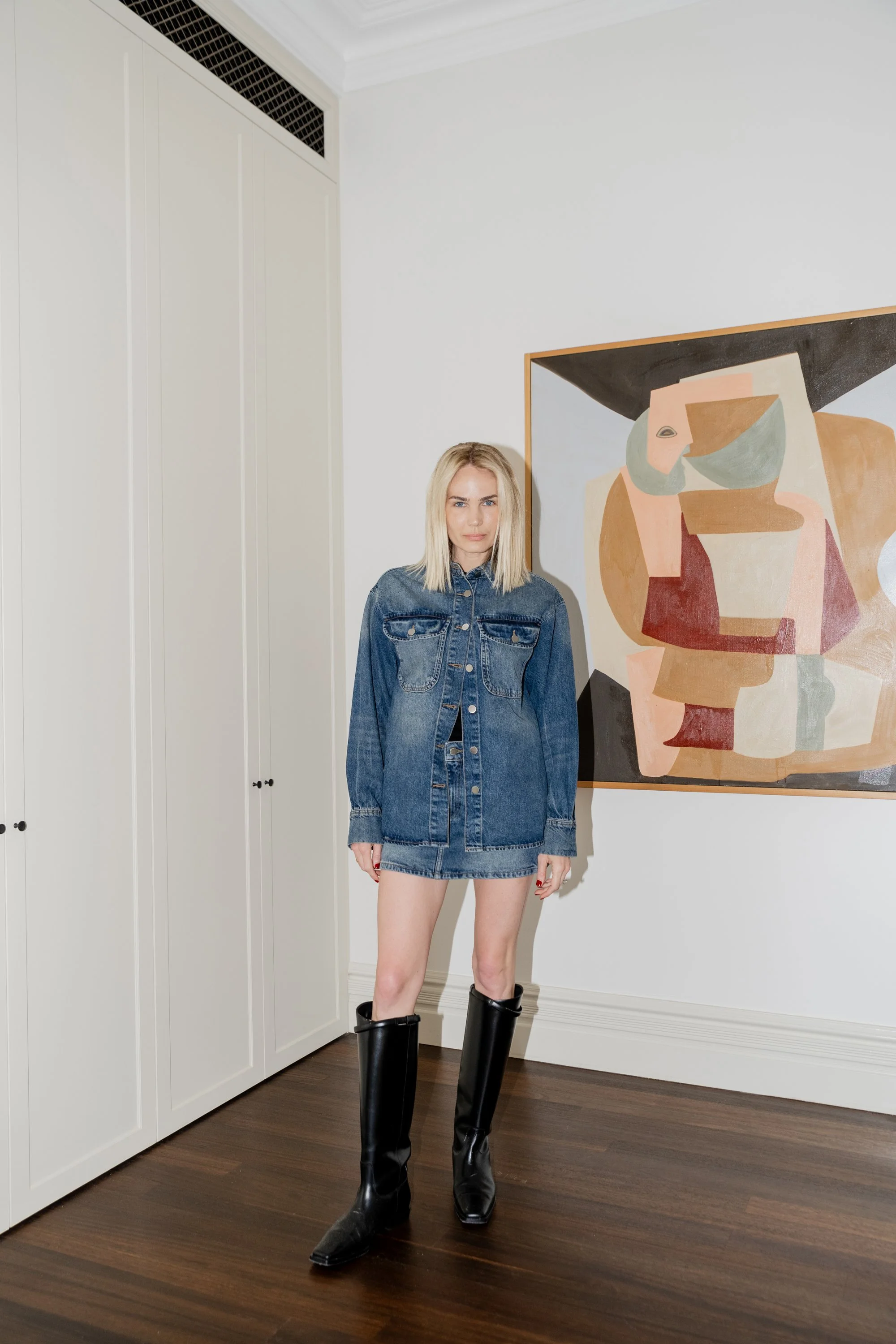 Brooke Testoni wearing DL 1961 Denim and Toteme Riding Boots