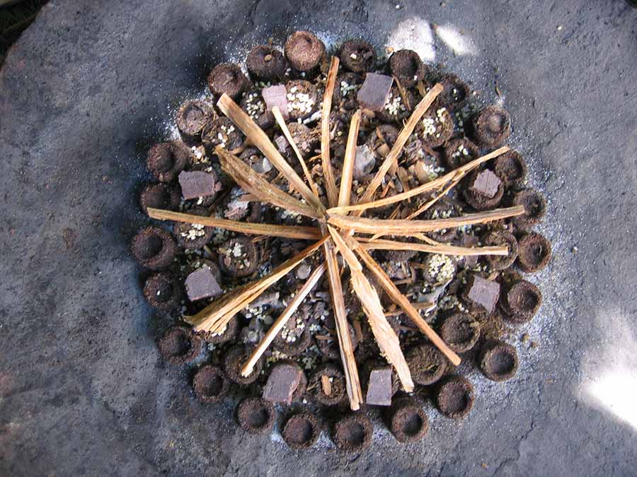 Figure 17. A nice arrangement of offerings for the fire, San Juan La Laguna. Photo by author.
