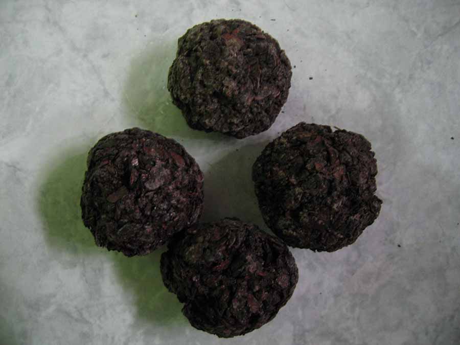 Figure 22. Balls of aromatic pine pitch, San Pedro La Laguna. Photo by author.