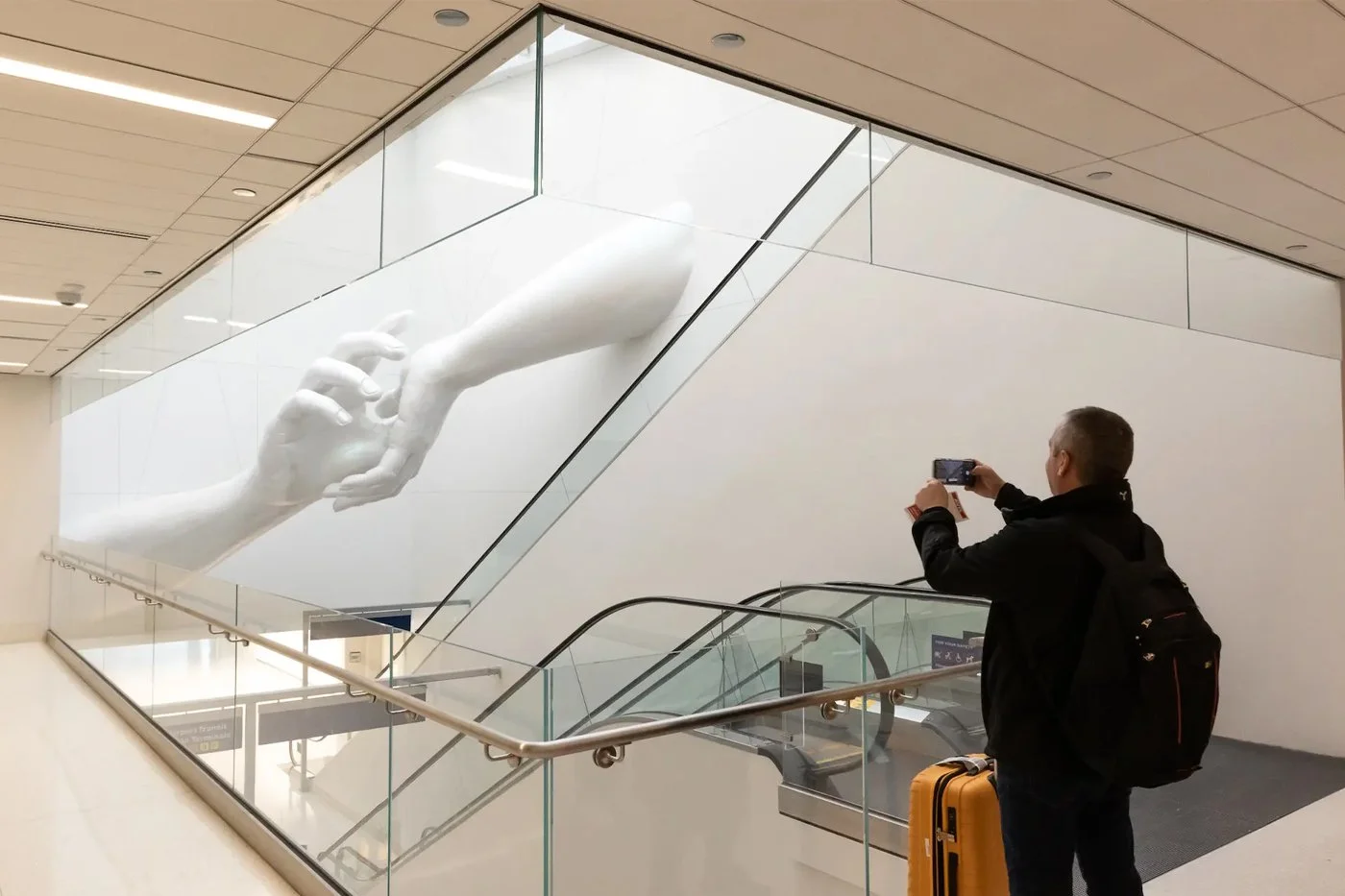 https___africanlhomme.com_image_2023_05_hank-willis-thomas-coby-kennedy-chicago-airport-sculpture-look-info-003.jpeg