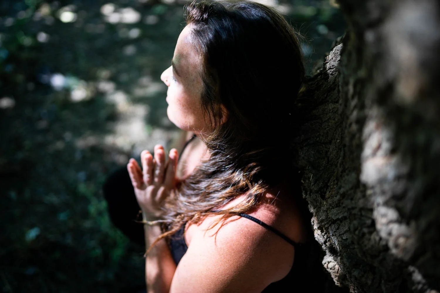 SEATED PRAYER AT TREE EVOKING REV.jpeg