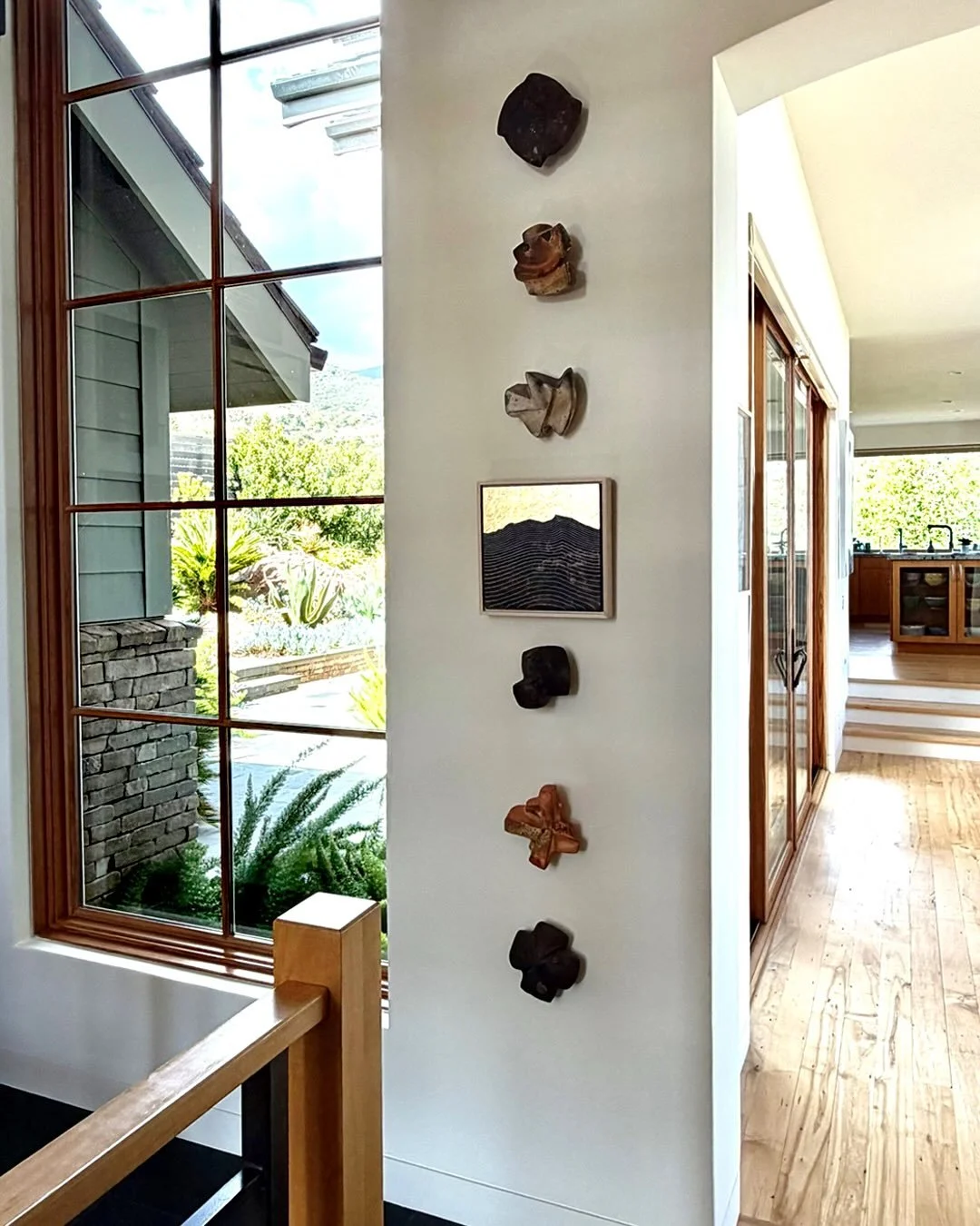 Always love when collectors share how they display my work in their homes. This pairing from the &ldquo;Shape of Stillness&rdquo; series with their ceramic collection, the earthy tones, the curation... bravo.