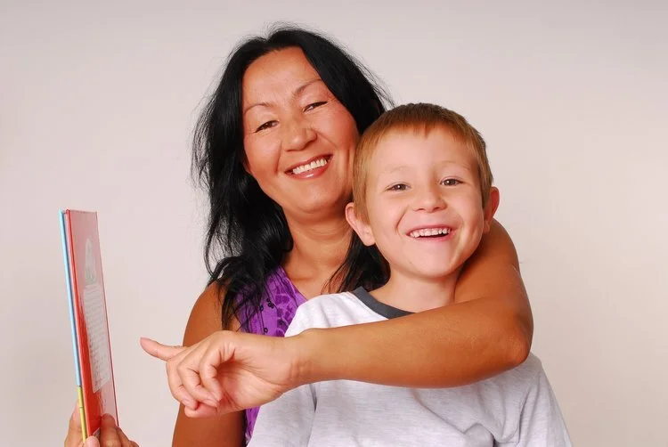 Happy model and model boy with big smiles.