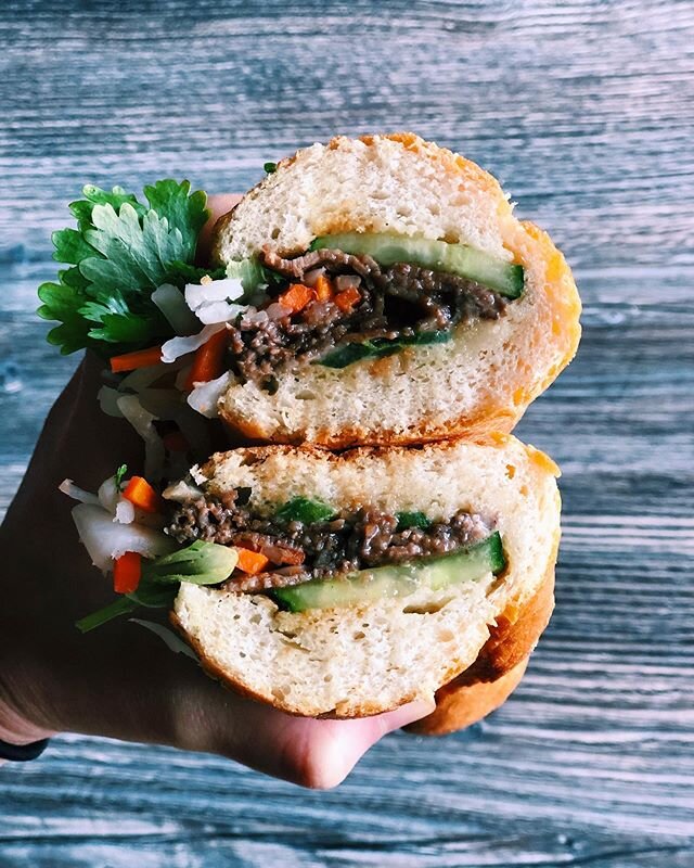 A favorite here at @phooldsaigon. Our lemongrass marinated bbq beef banh mi. The perfect ratio of fillings and bread. Not too hard, not too soft, just the right amount of crisp and a medley of flavor. We got our equation just right. Order it for #tak