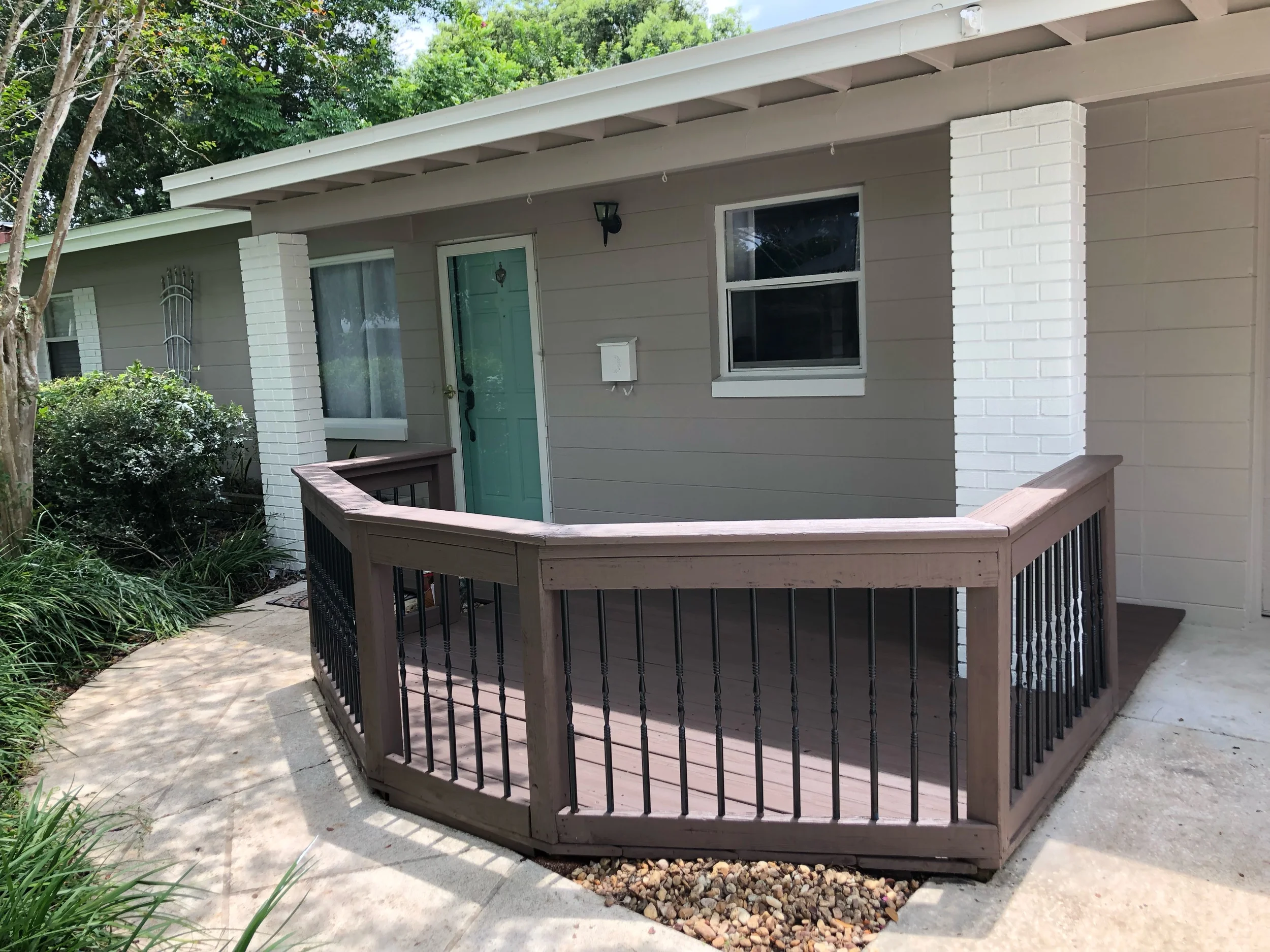 Exterior paint of masonry and wooden deck