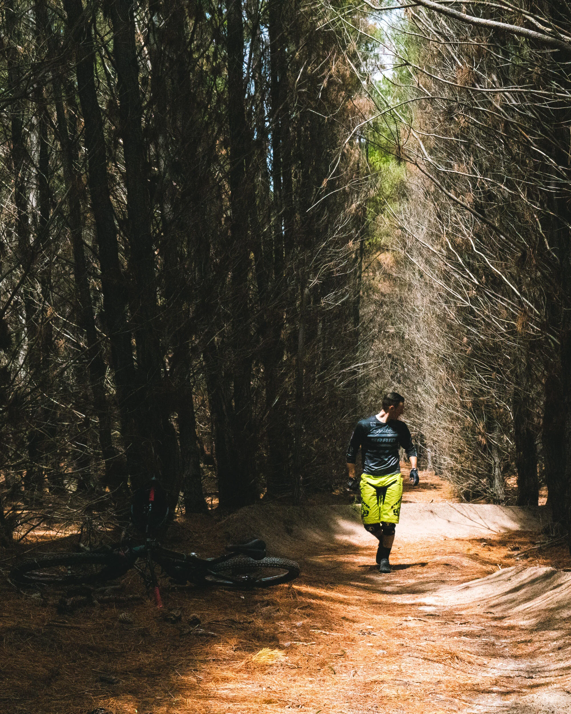 Rider checking the berm before riding through.
