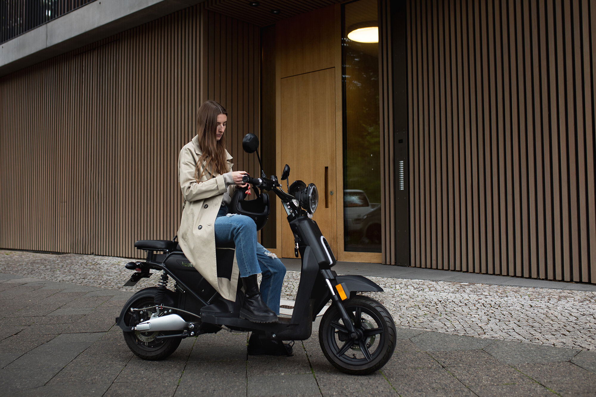 Britta Reineke, founder of ellectric tests the e-scooter from Vostok