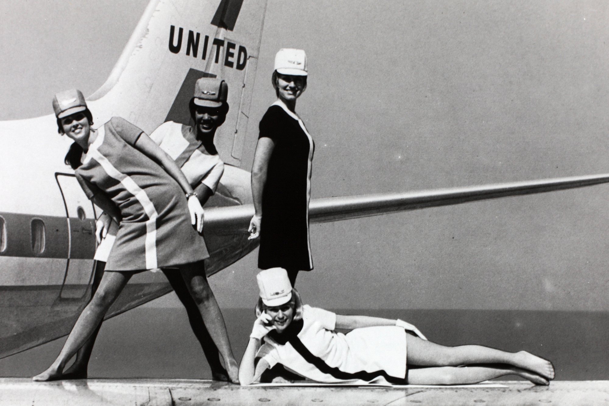 Stewardess in the 60ies on an airplane