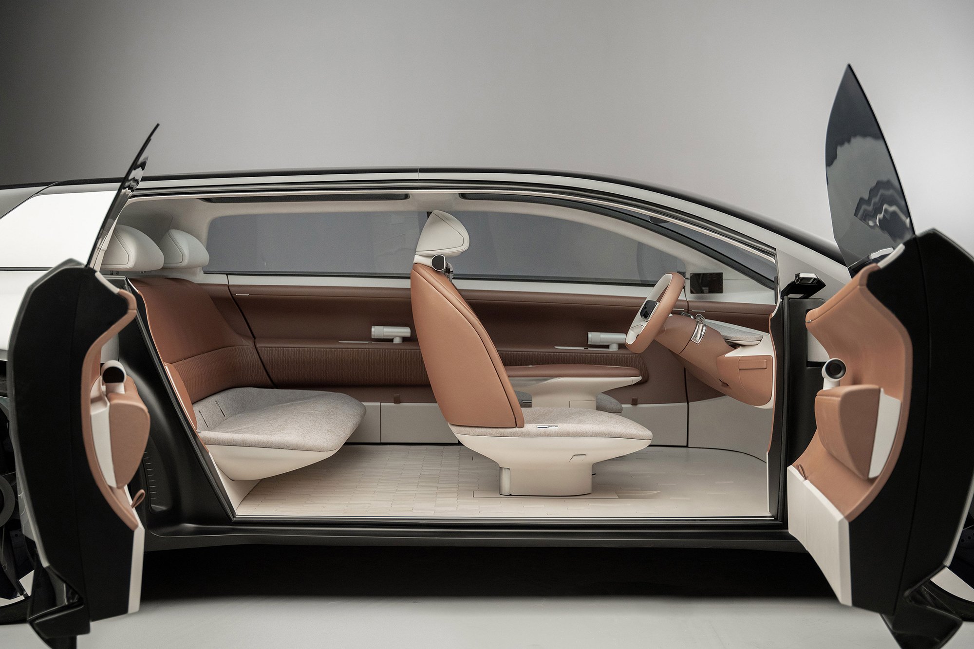 The interior design of Tata Motors's new electric cepnpt car The exterior design of Tata Motor's new electric concept car AVINYA