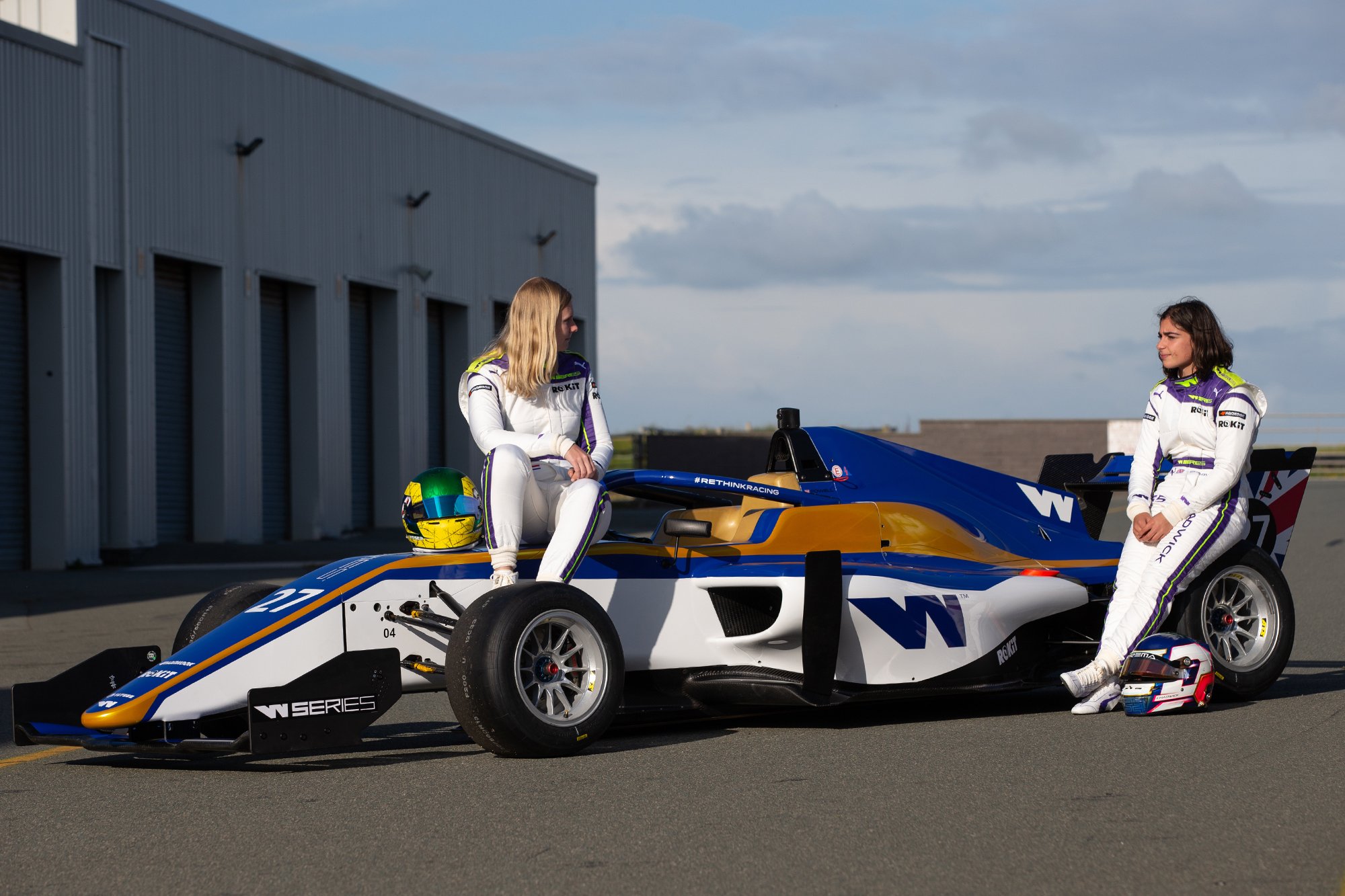 Jamie Chadwick and Beitske Visser wearing the Puma Motorsport racing suits for W Series