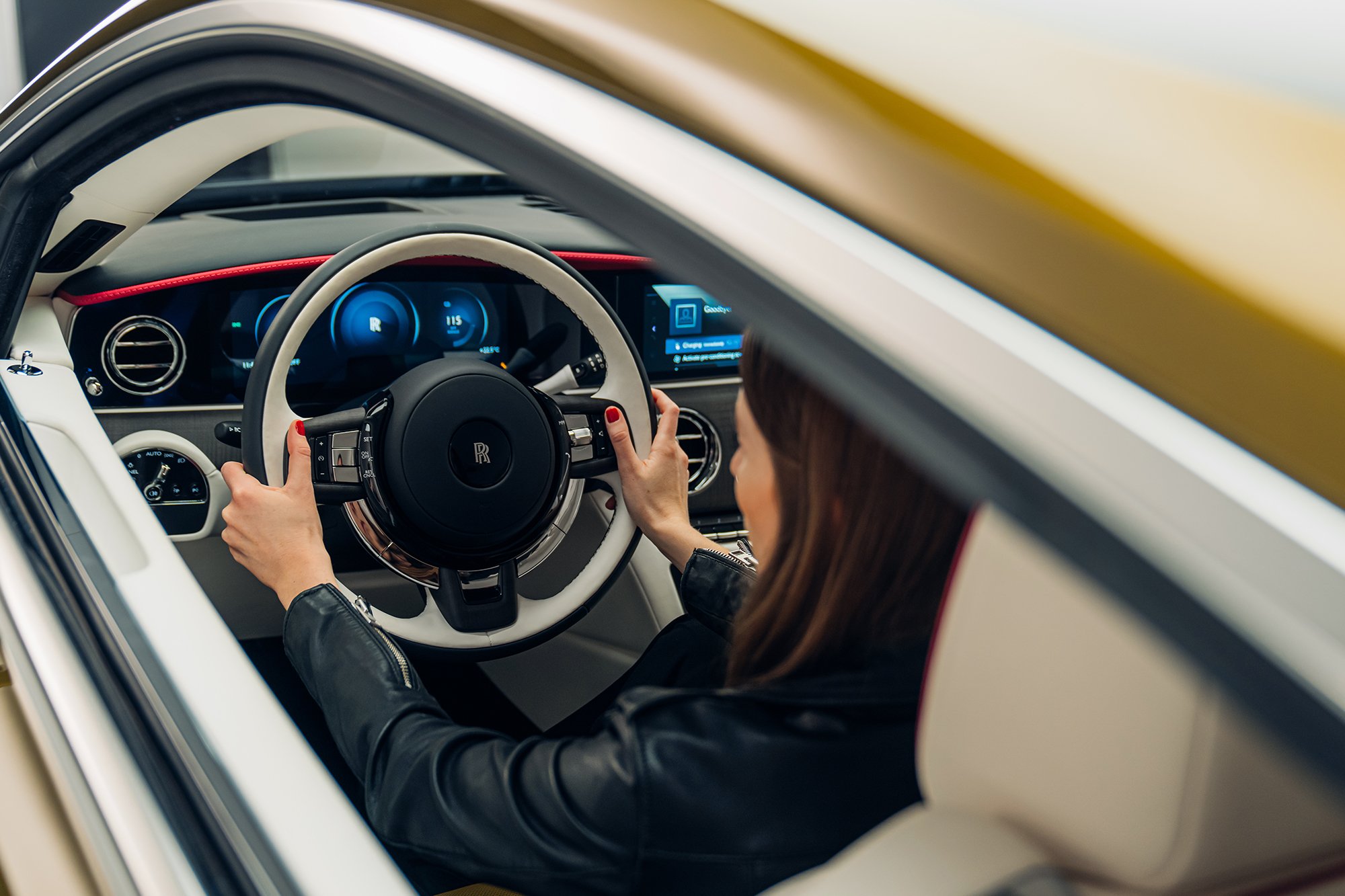 Britta Reineke, founder of ellectric takes seat in the all-electric Rolls Royce Spectre and gives an insight into the interior design