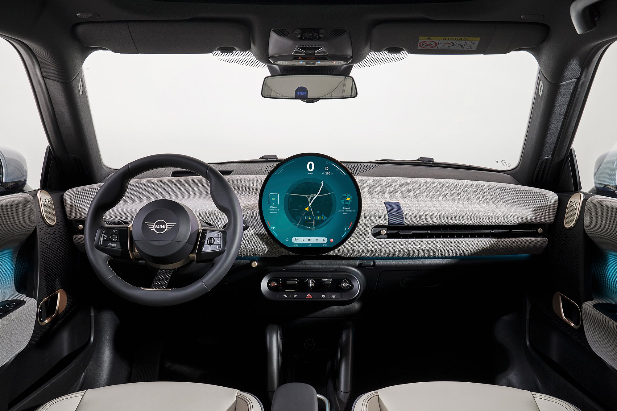 The front seat and dashboard design of the new all-electric MINI Cooper 