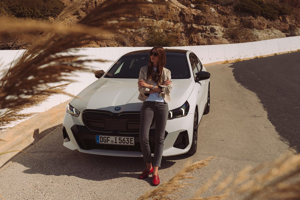 Britta Reineke, founde of ellectric with the all-electric BMW i5 M60 in Portugal