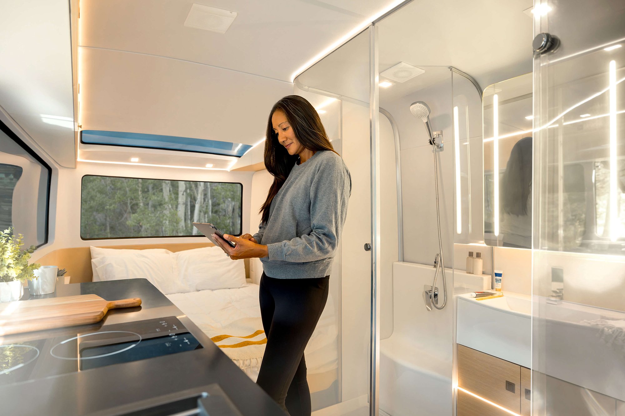 The kitchen and bathroom design of the all-electric, self-propelled travel trailer Pebble Flow