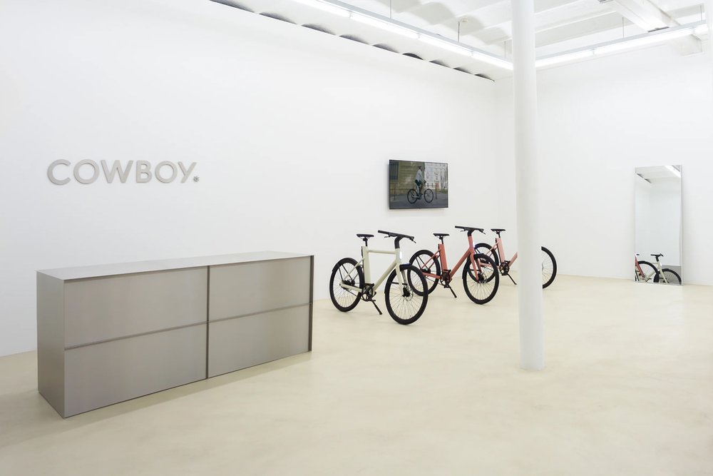 The minimalistic interior design of Cowboy's new brand store in Brussels
