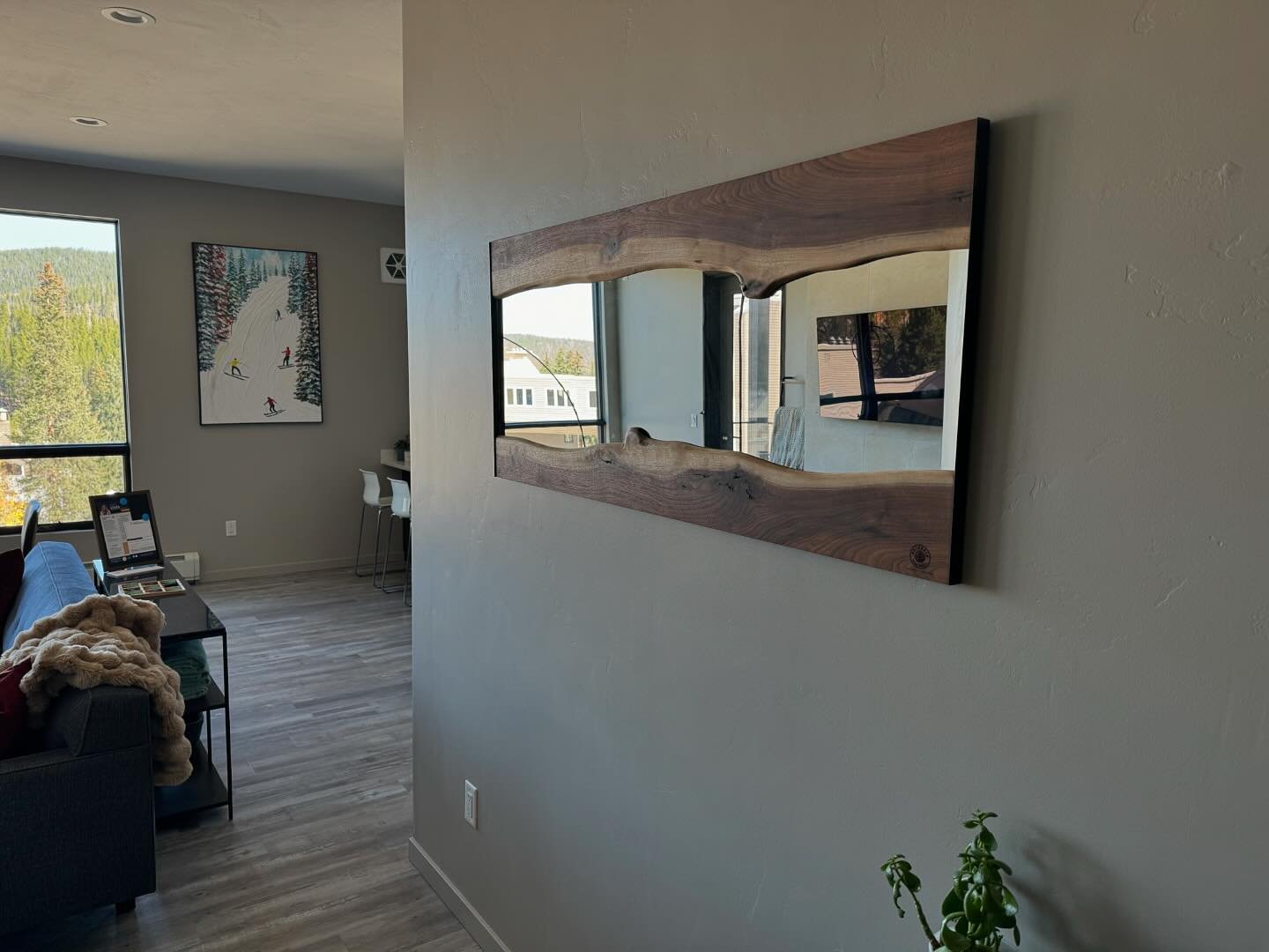 RWP slope side in #winterpark CO with this clean lined modern mirror.  PM me for pricing and size options. #mirror #liveedgemirror #livingroom #wood