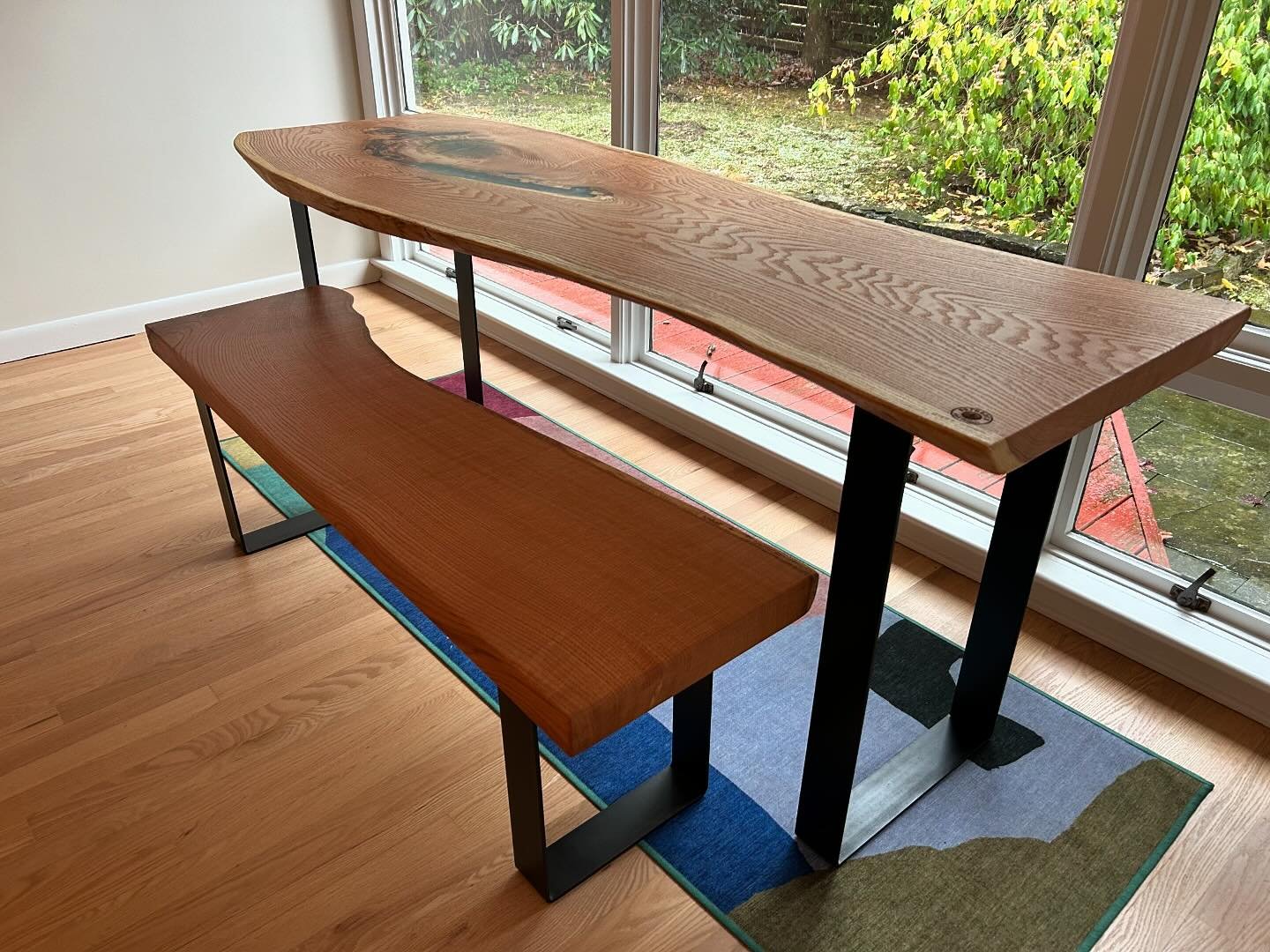 Table with a view&hellip; bringing the outside in!  This red oak table with matching bench was delivered this week.  #rothrockstateforest #rothrockcoffee #happyvalley #pennstate #magicresin #liveedgefurniture