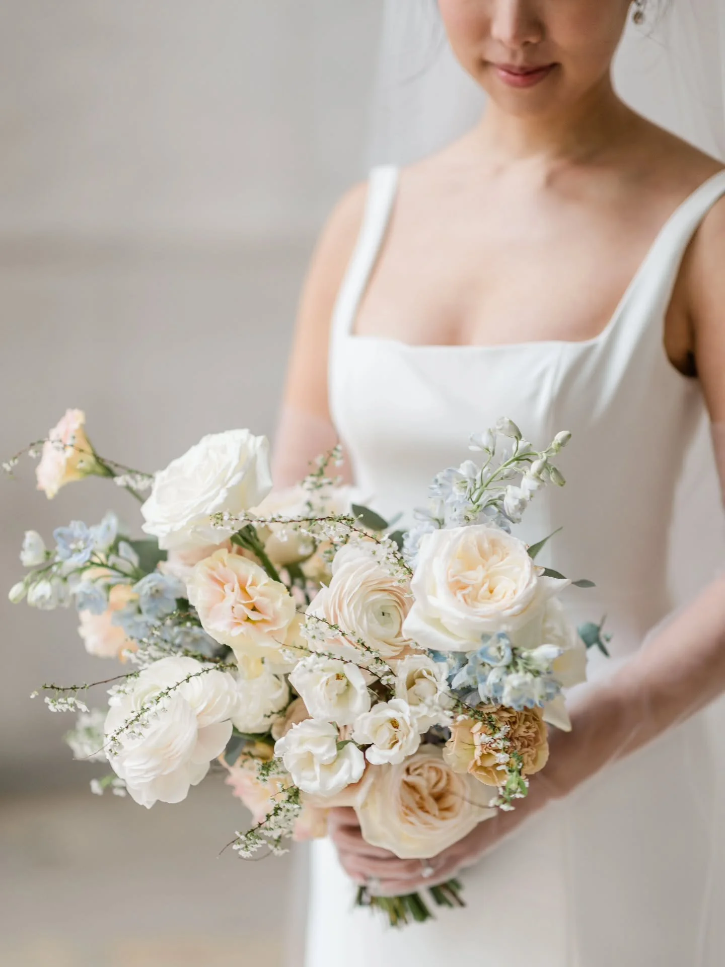 The details are the design. This is what we mean when we say nothing is accidental.

Garden roses, ranunculus, and just enough texture to keep it interesting. Every stem chosen with intention; every placement considered.

This is the standard we hold