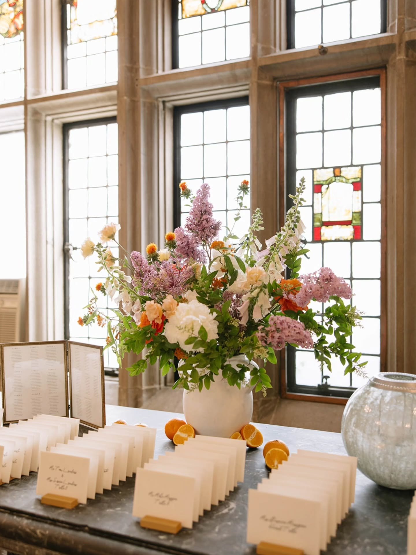 Citrus for warmth, lavender for softness, Skylands Manor for drama. 

This tented Summer wedding pulled all three together into a palette that felt fresh without losing romance. Every stem was chosen to hold its own against the manor's grand architec