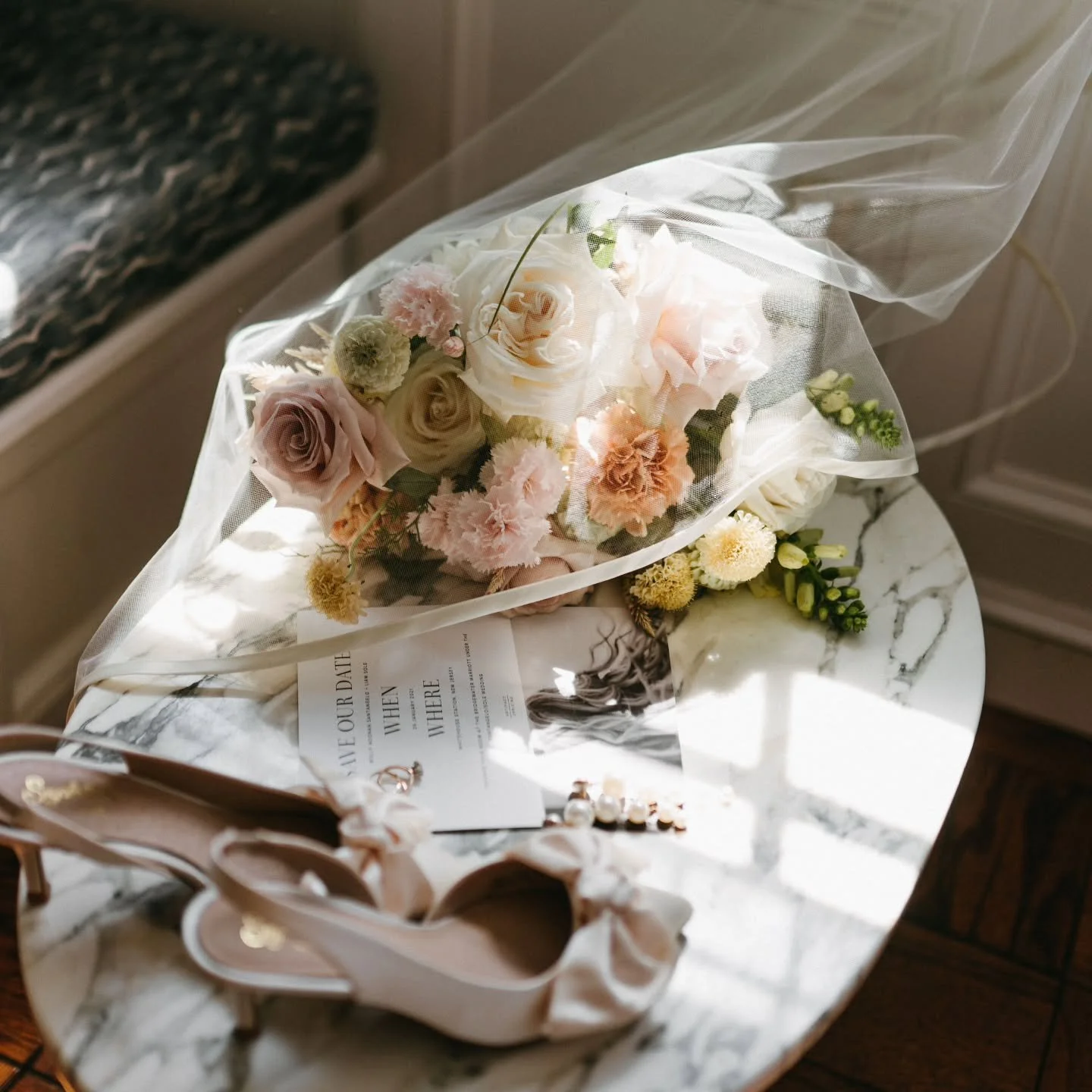 This is the bouquet before it is carried, resting quietly beside heels that have not yet taken a single step down the aisle.

Some of the best parts of a wedding day happen before anyone else notices but you.

Day 19 of our one post a day series.

Li