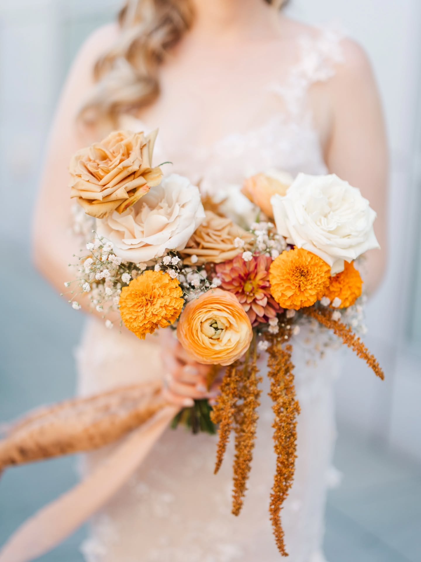 A study in warmth: orange, terracotta, and white, built around locally grown marigolds and dahlias.

#fallweddinginspo #customweddingdesign #luxuryweddingflowers #hobokenweddingflorist #njweddingflorist