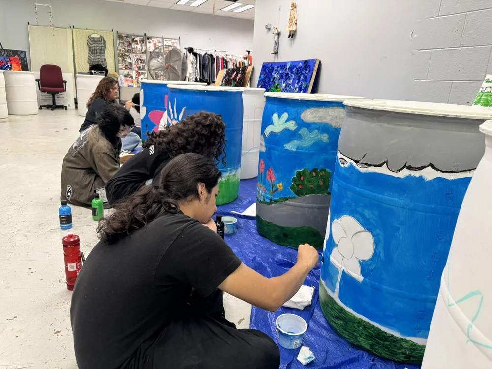 Environmental Arts Interns Rain Barrel Painting