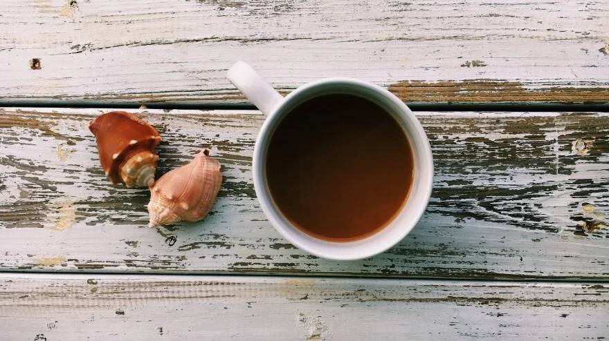 coffee mug at the beach.jpg