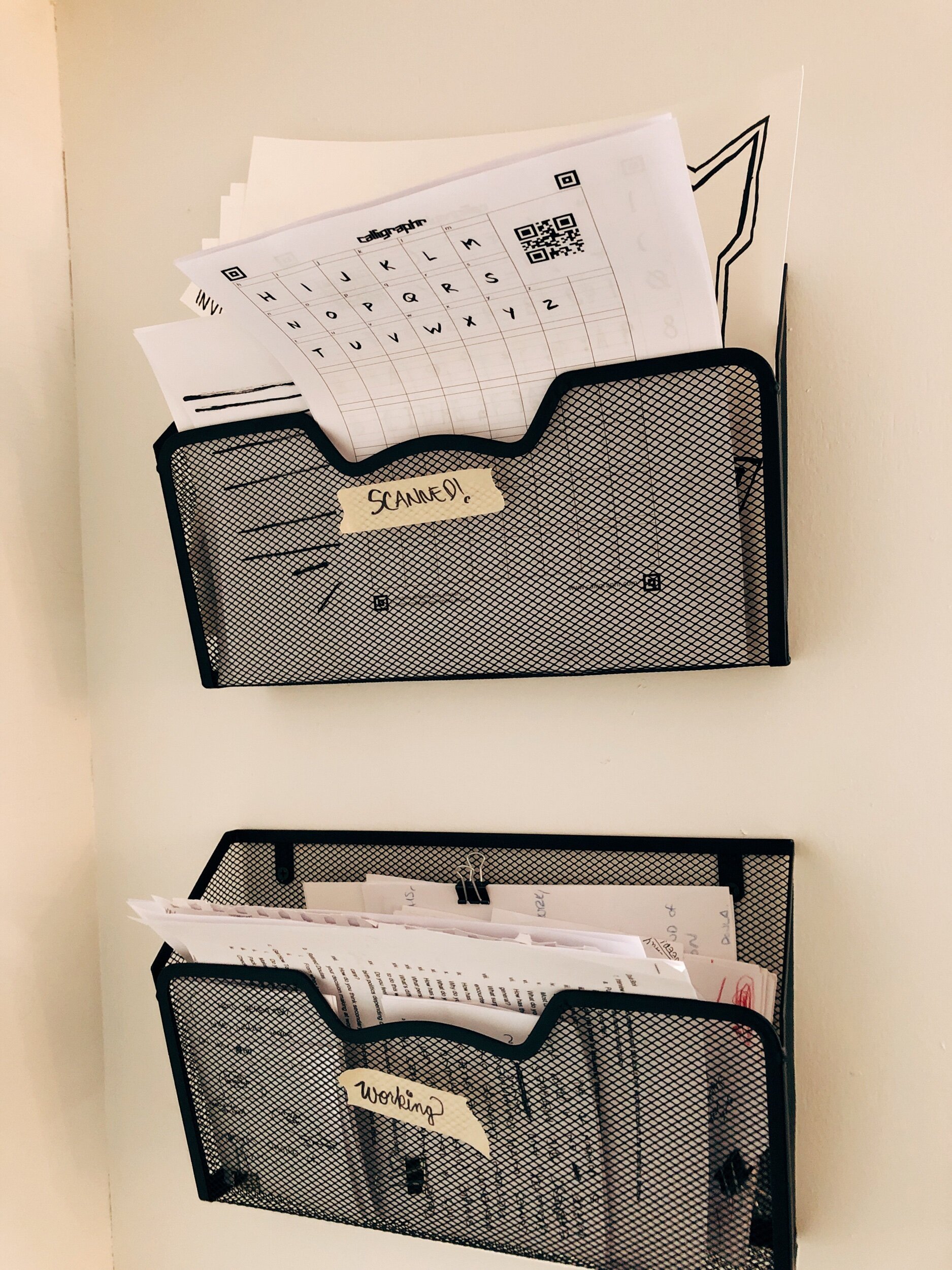 Wall pockets are everything! I have seven in use right now. They keep art clutter organized and off my workspaces.