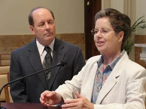 Sister Nora Nash and Father Tom McCaney meeting with Wells Fargo