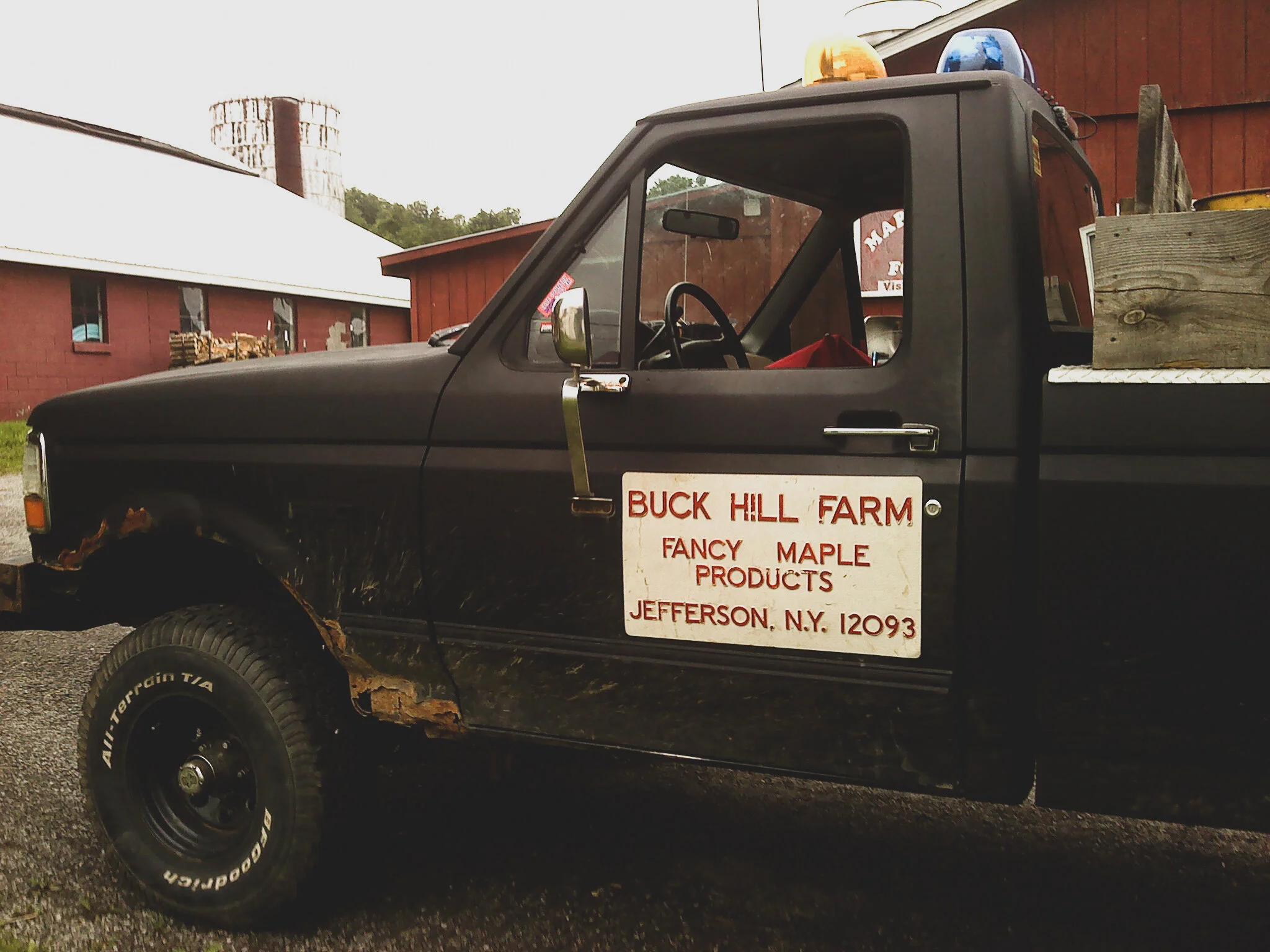 sams old ford with buck hil sign.jpg
