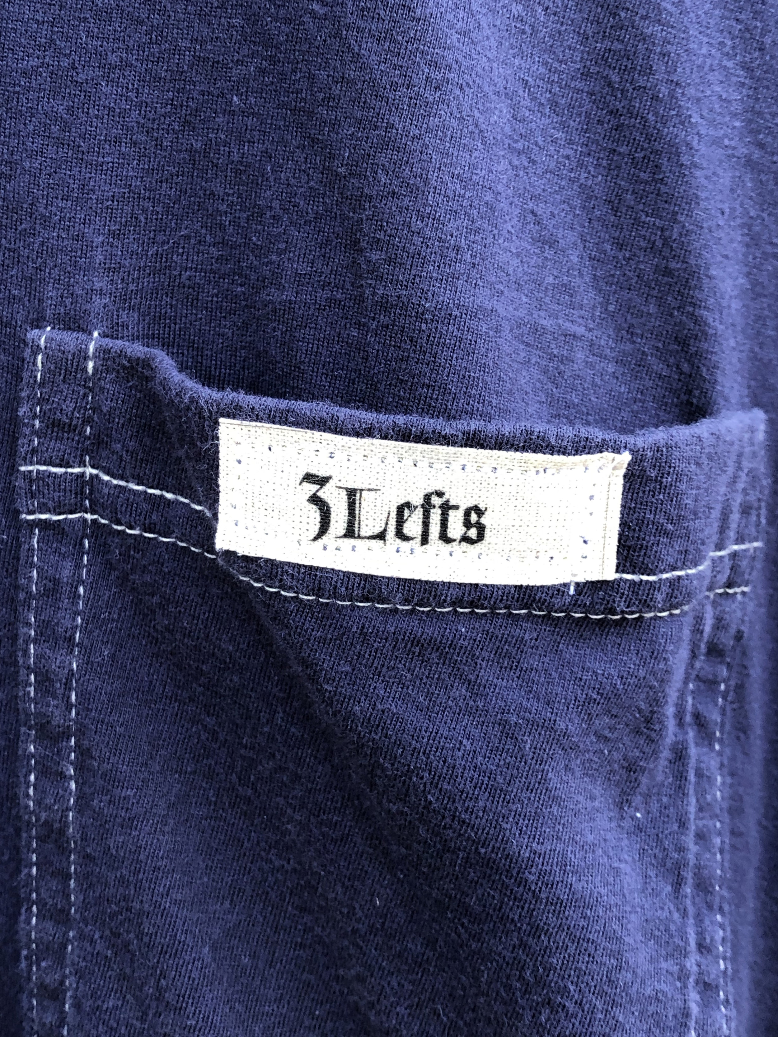 3Lefts-outlier-stencil-polo-pocket-tag.jpg