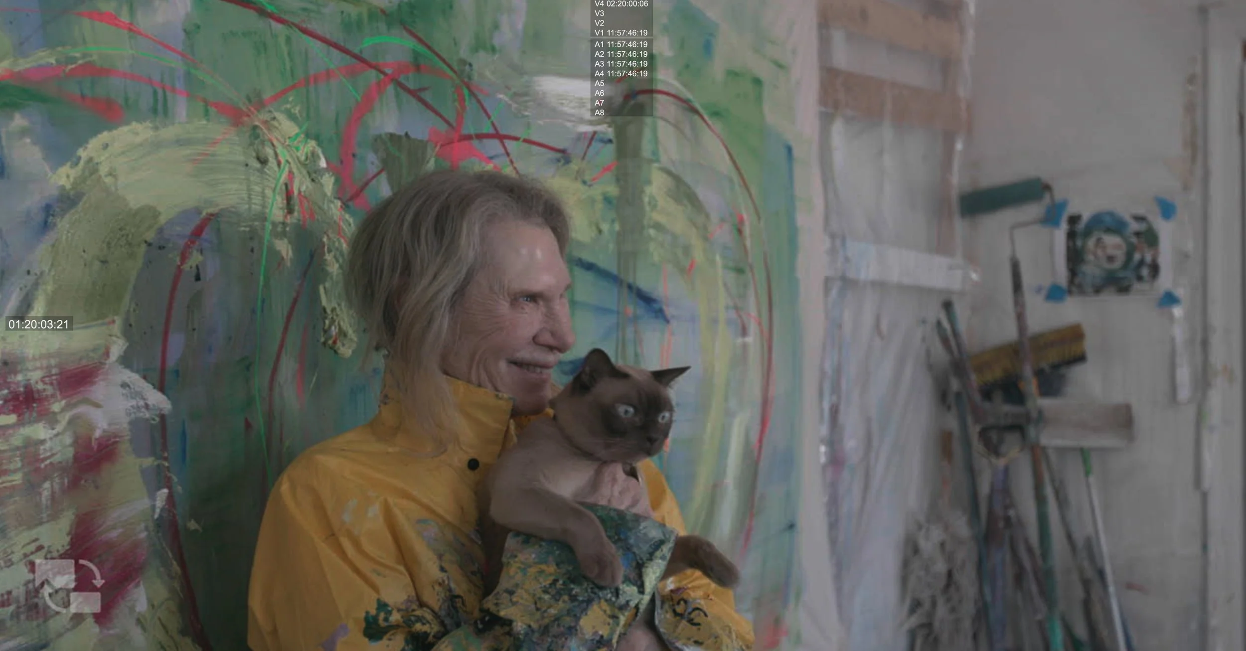 *Francine Tint with cat against her canvas.jpg