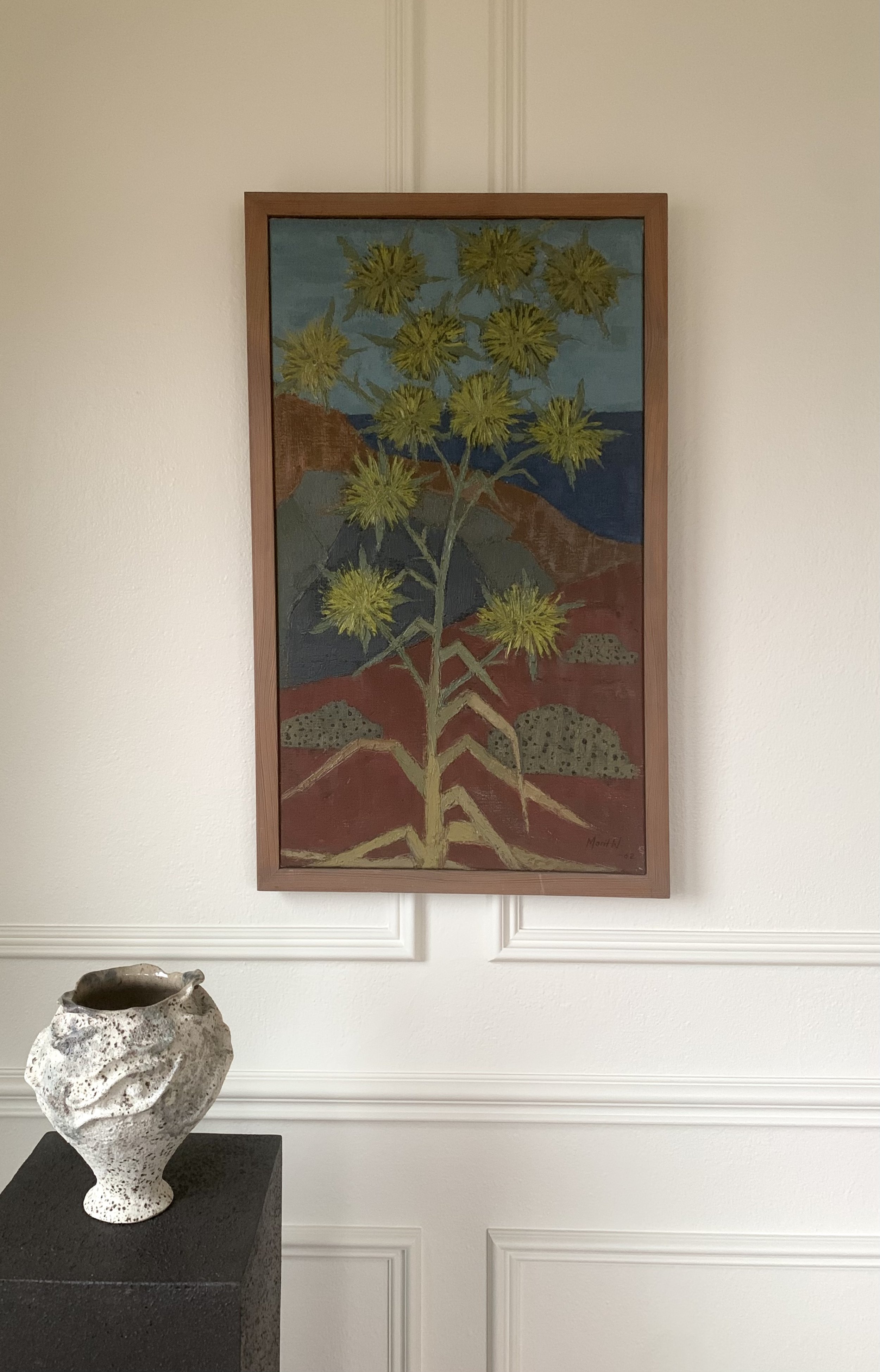 ‘Thistle II’ (1952) by Marit Wahlstrom Schonback, a framed oil painting depicting a wild thistle plant amongst the Swedish coastline.