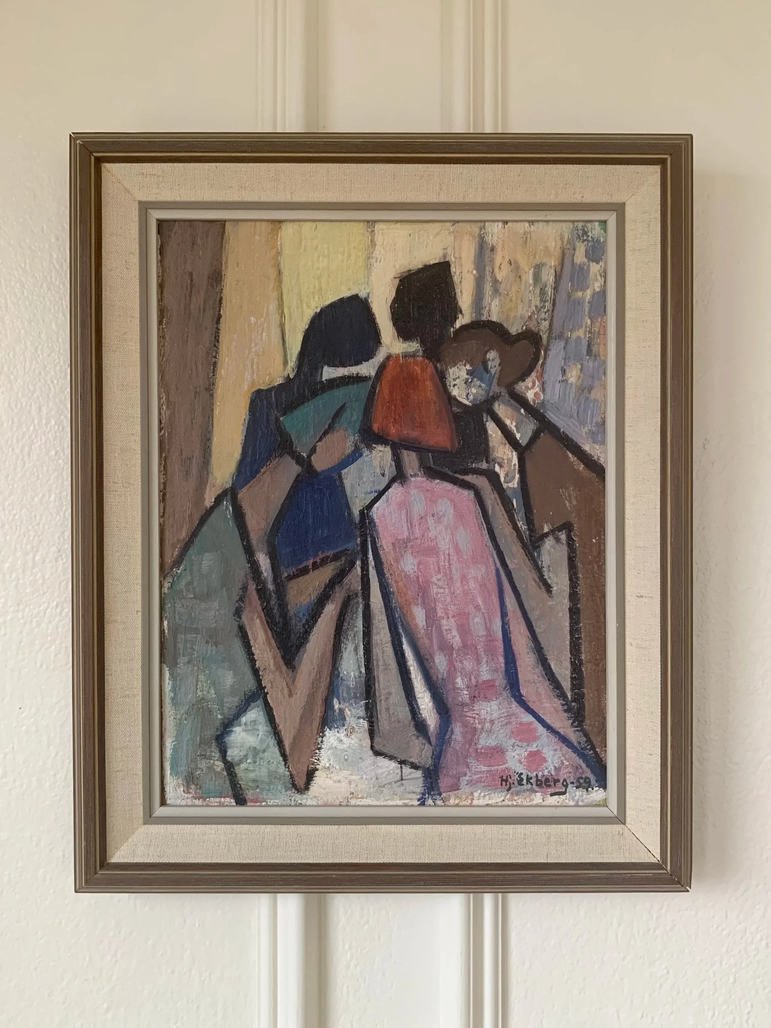 ‘Girlfriends’ (1959) by Hjalmar Ekberg, a framed Modernist oil painting of three female friends leaning close together to talk.
