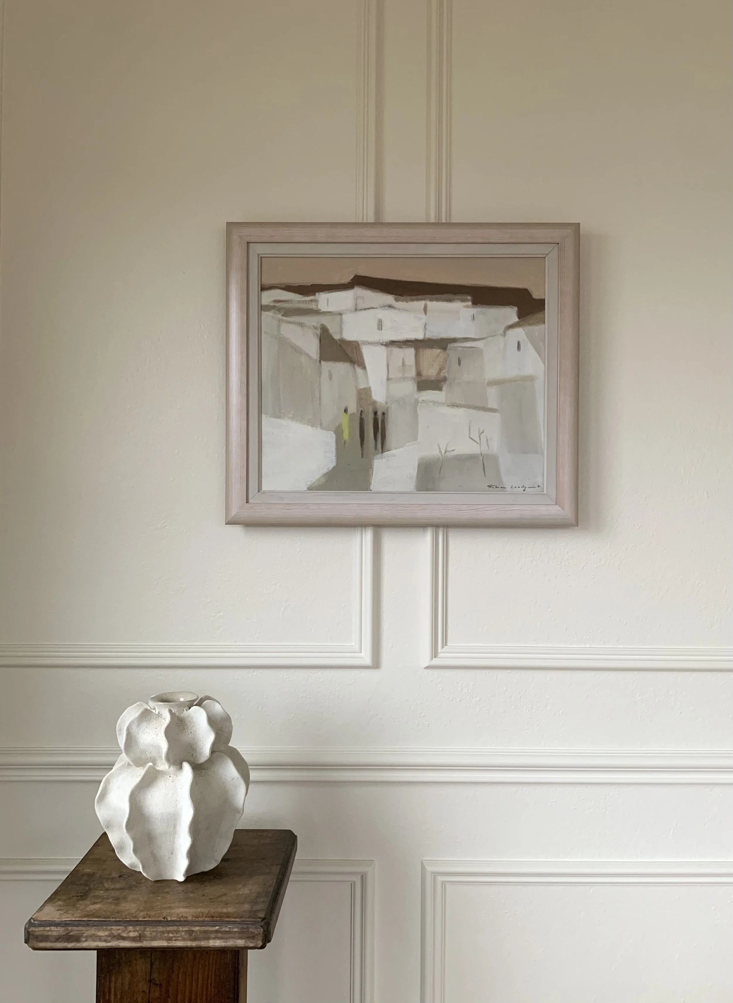 Detail of ‘Spanish Village (Woman in Chartreuse Dress)’ (ca. 1960s) by Fabian Lundqvist, showing painting hanging on wall in a room.