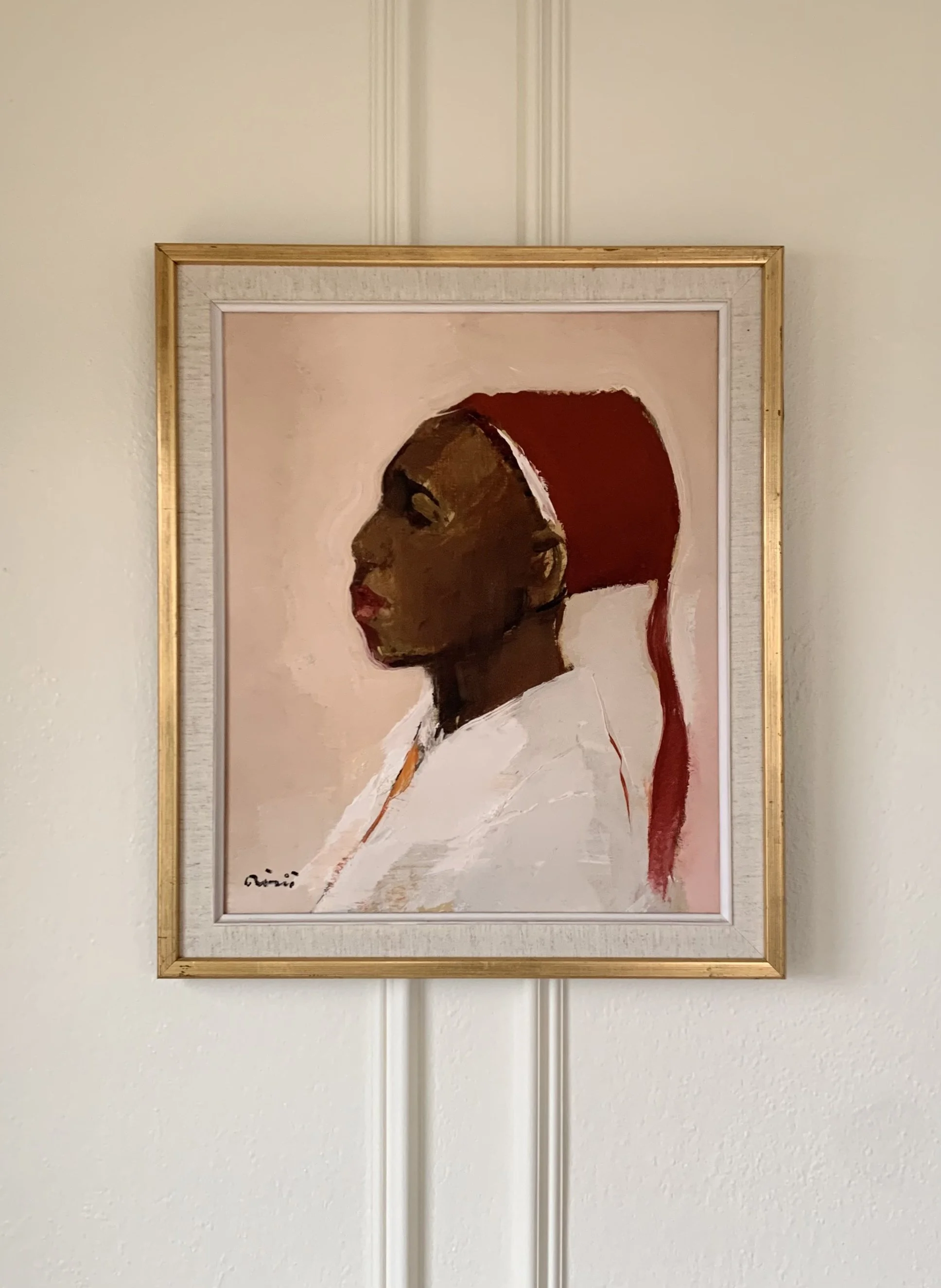 Striking Woman in a Red Hat