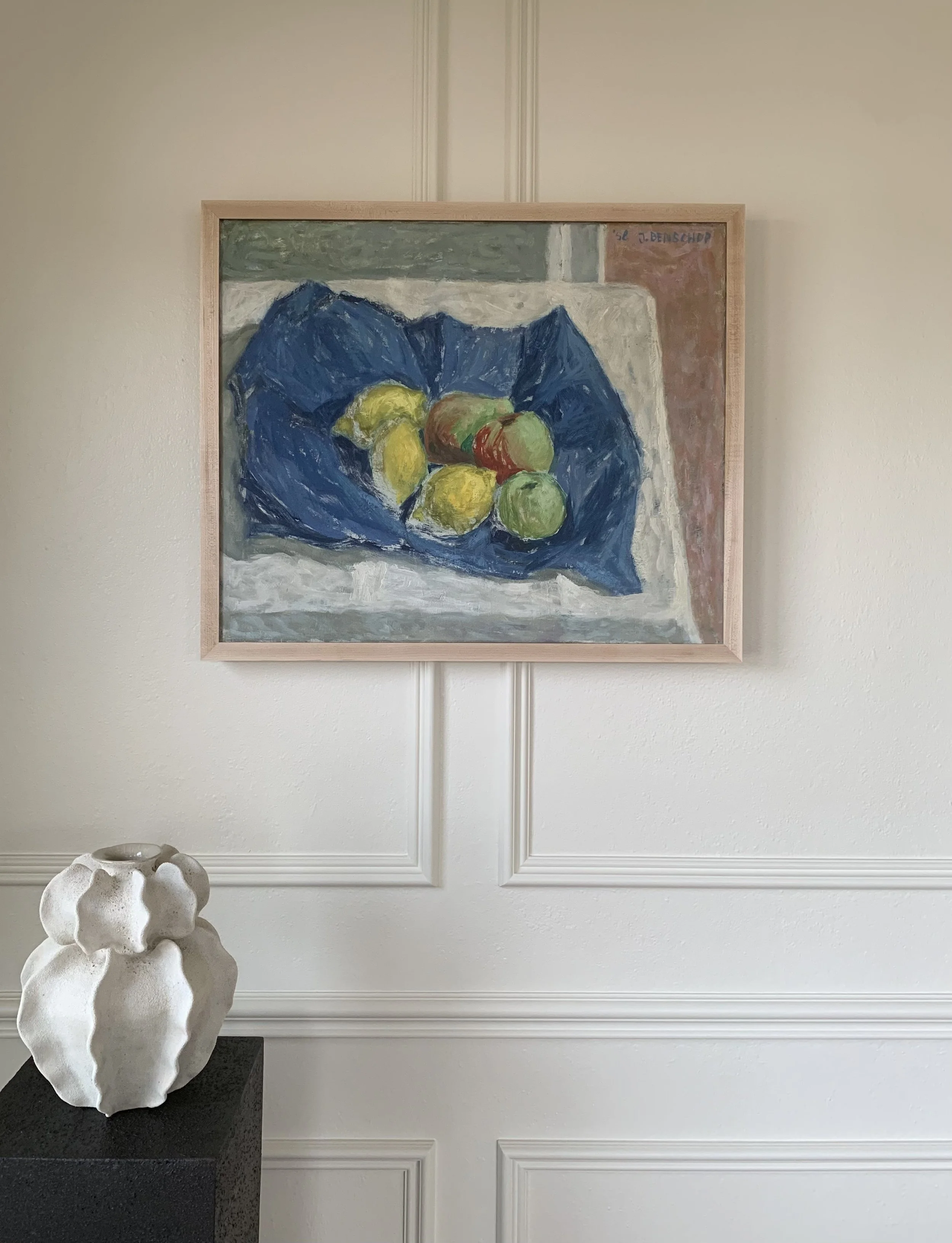 Detail of ‘Lemons and Pears’ (ca. 1960s) by Jaap Benschop, a framed oil painting, showing the painting hung on a wall in a room.