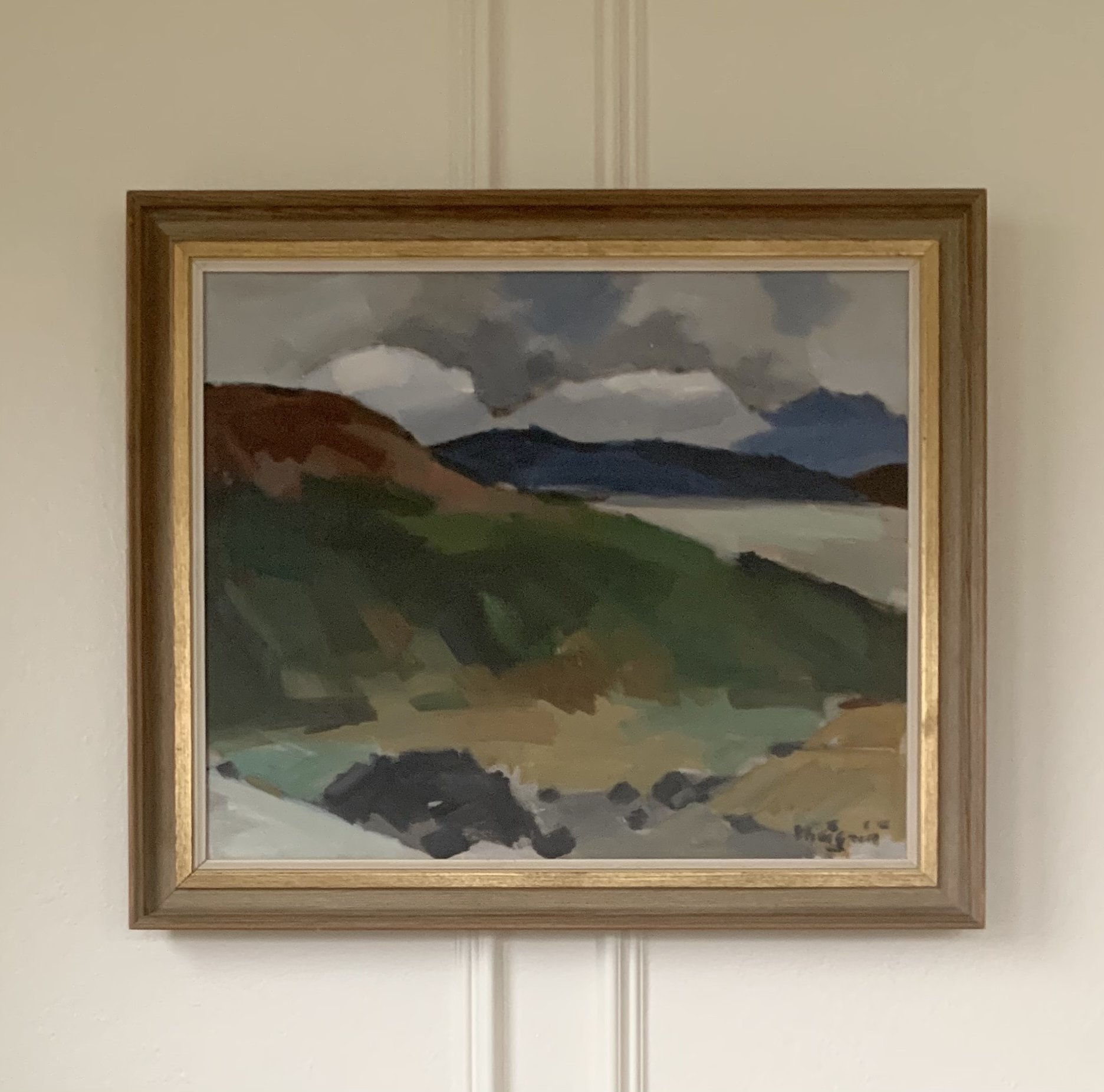 ‘Expressive Mountainscape’ (ca. 1960s), a framed landscape oil painting by Ivar Hjertqvist showing colorful expanse of rolling mountains below a partly cloudy sky.