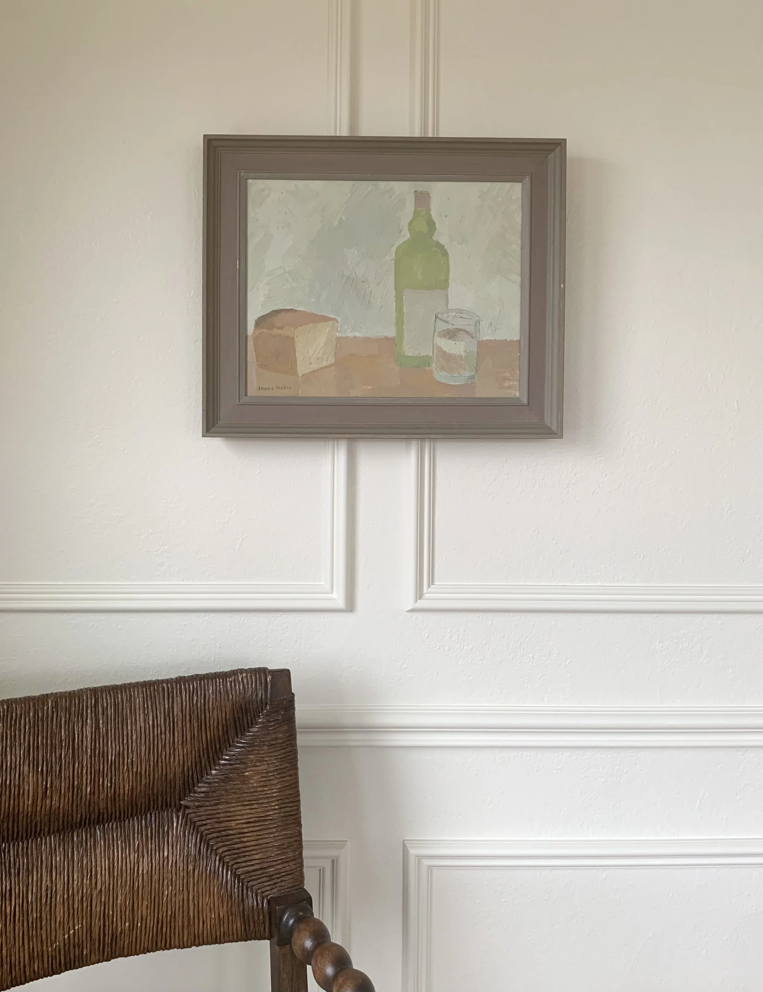 ‘Breakfast Still Life’ (1957) by Hans Holm, hanging on a wall.