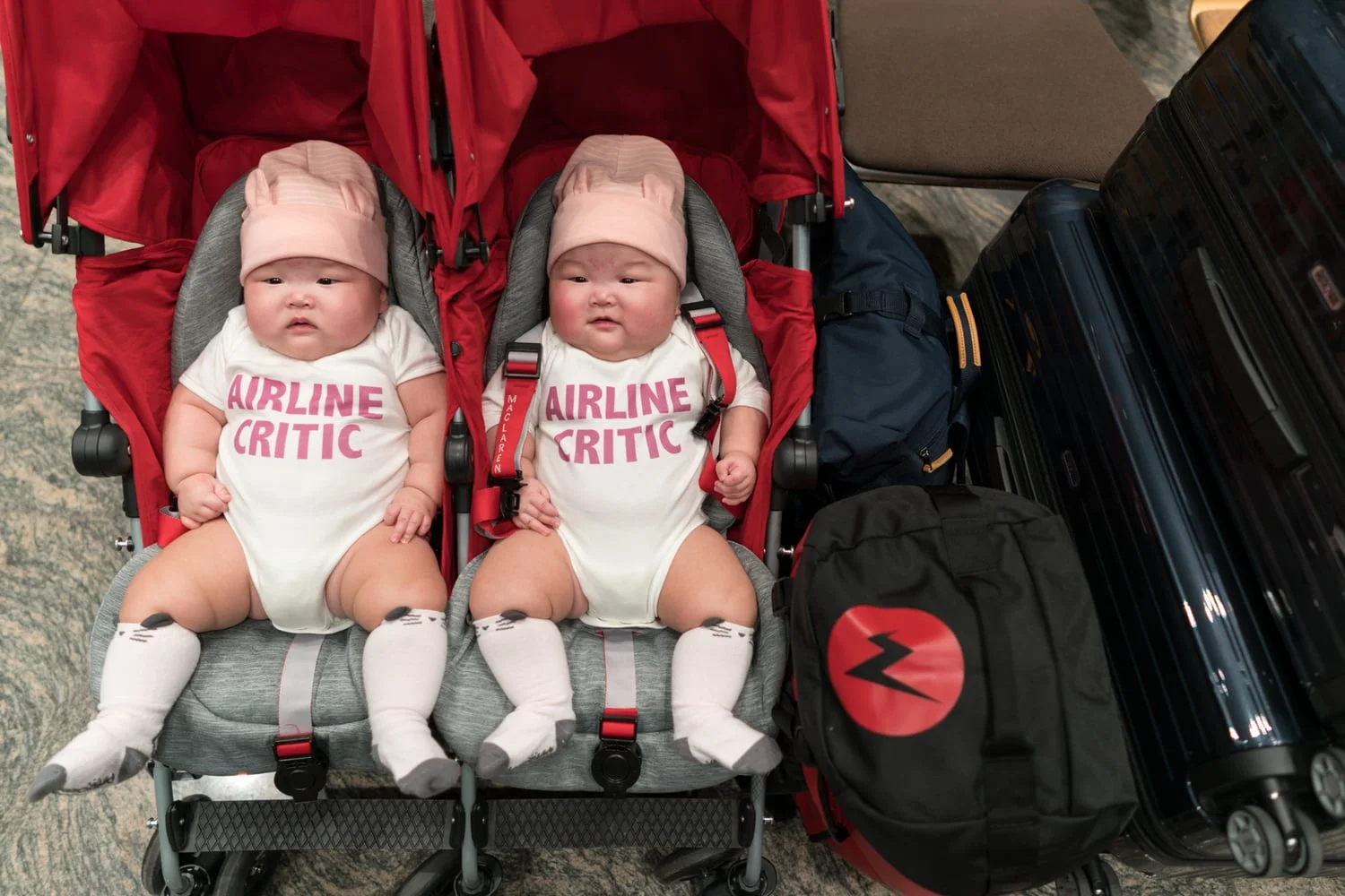 Leia gave her charming wide-eye look to the check-in service team. It wasn’t a full flight so we scored a comfortable whole row seating. I guessed their cheeky tees probably helped as well =)